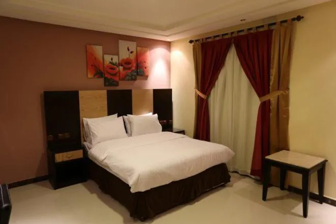 Bedroom, Bed in Tulip Rawda Serviced Apartments