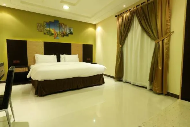 Bedroom, Bed in Tulip Rawda Serviced Apartments