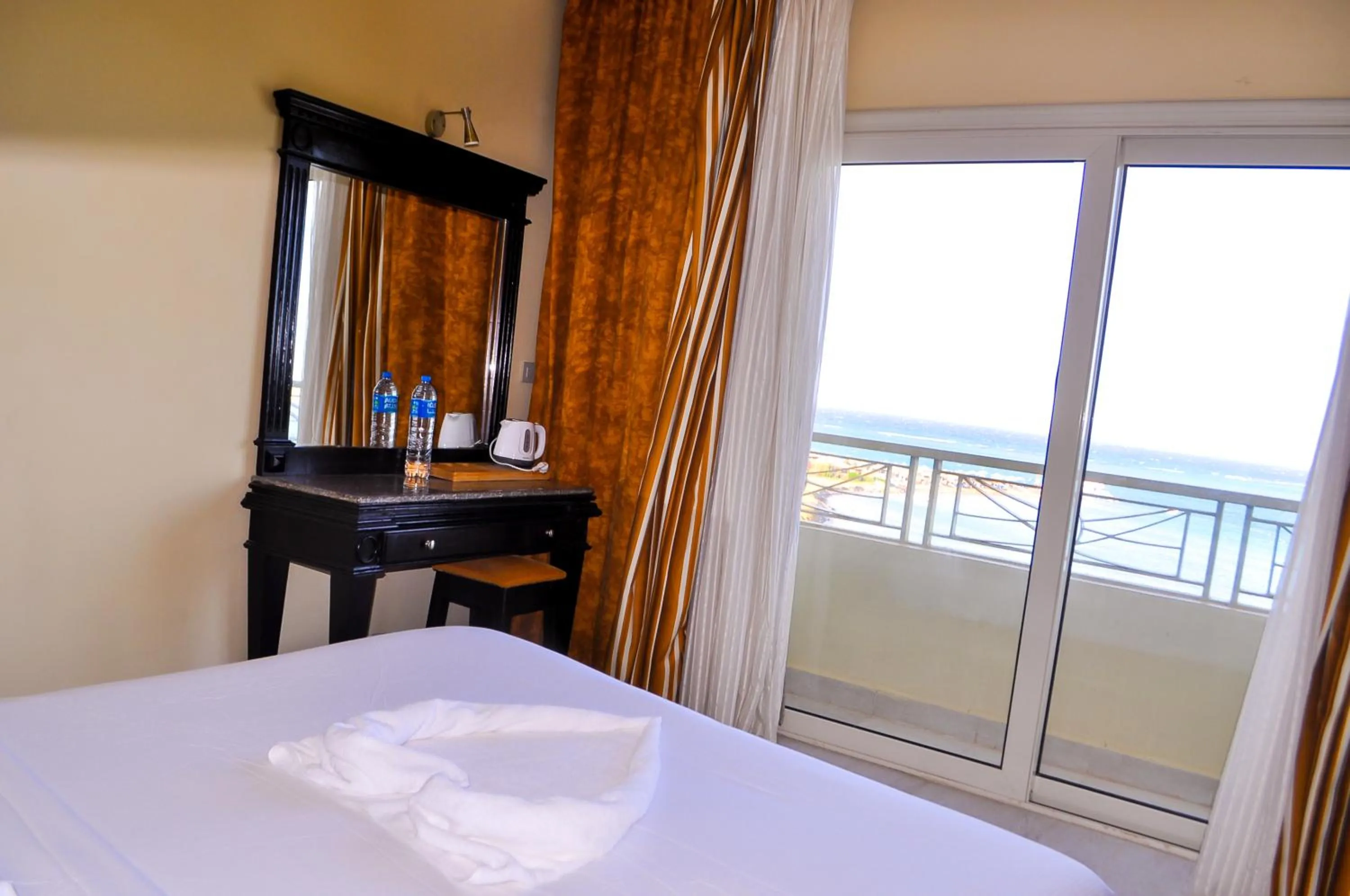 Balcony/Terrace, Bed in Magic Beach Hotel Hurghada