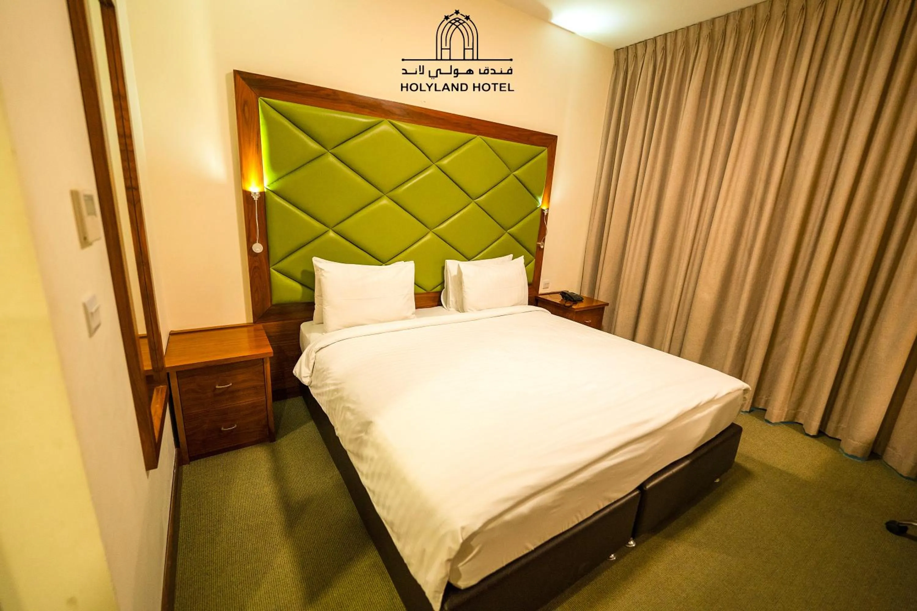 Bed in Holyland Hotel Amman