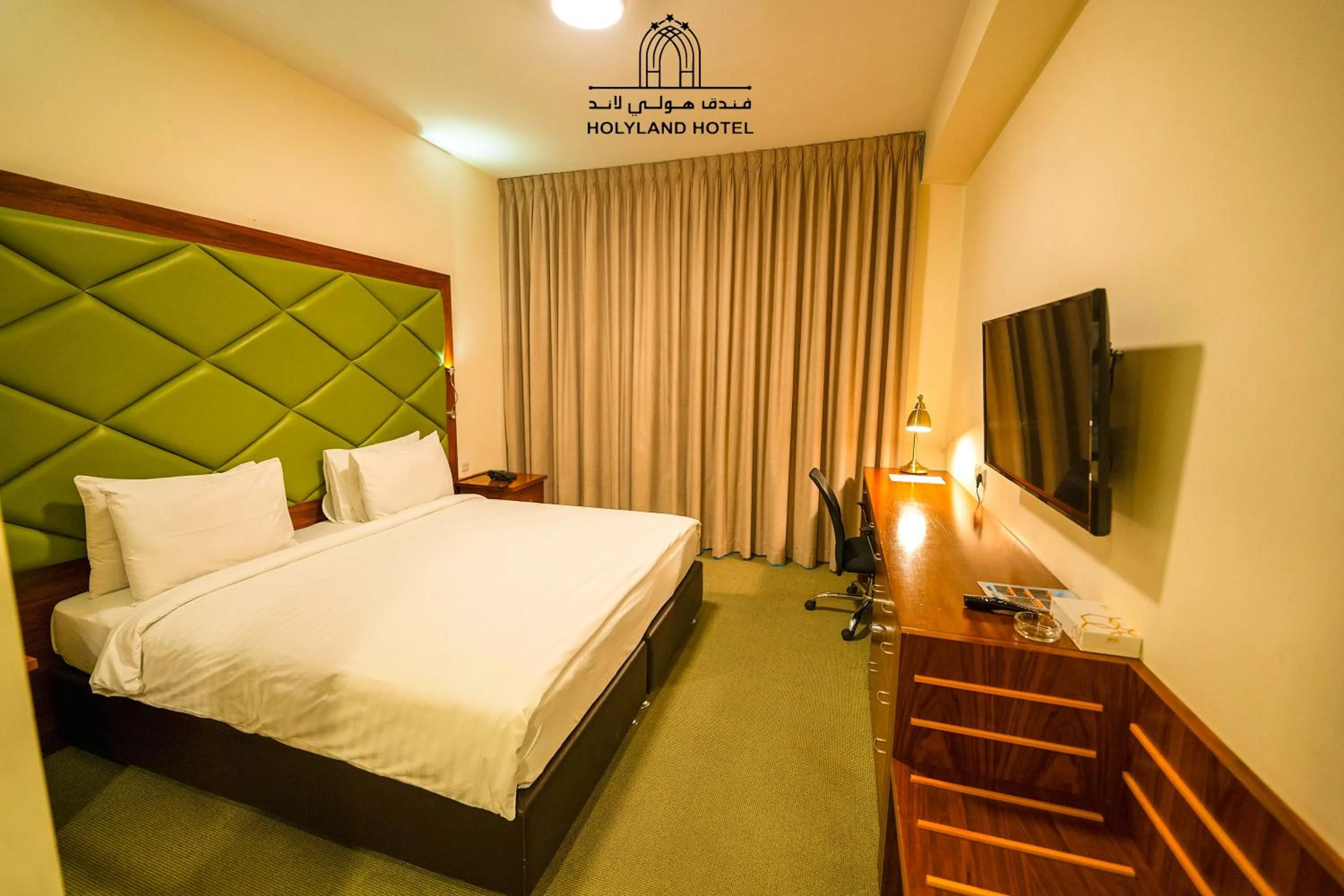 Bed in Holyland Hotel Amman