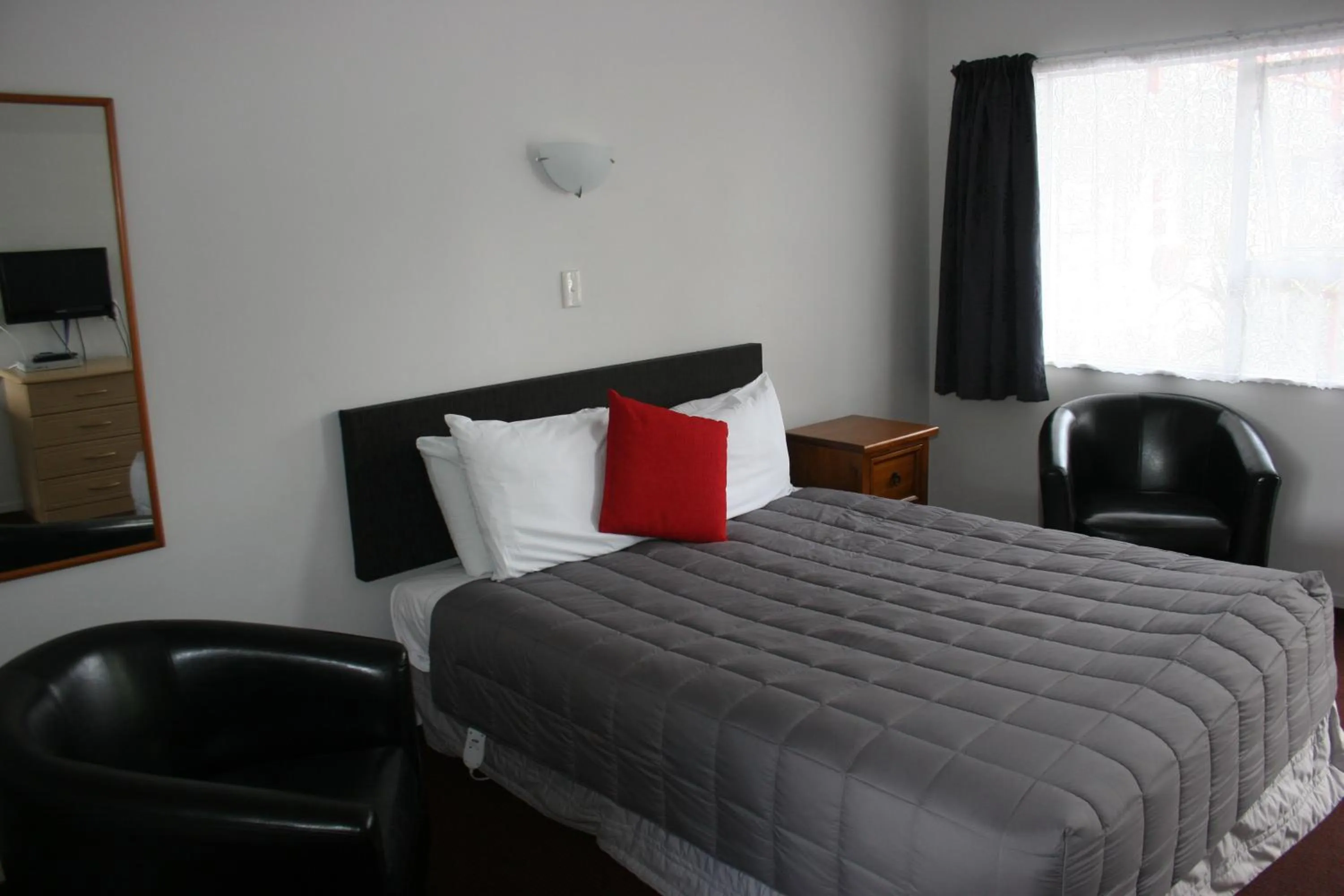 Photo of the whole room, Bed in Burgundy Rose Motel