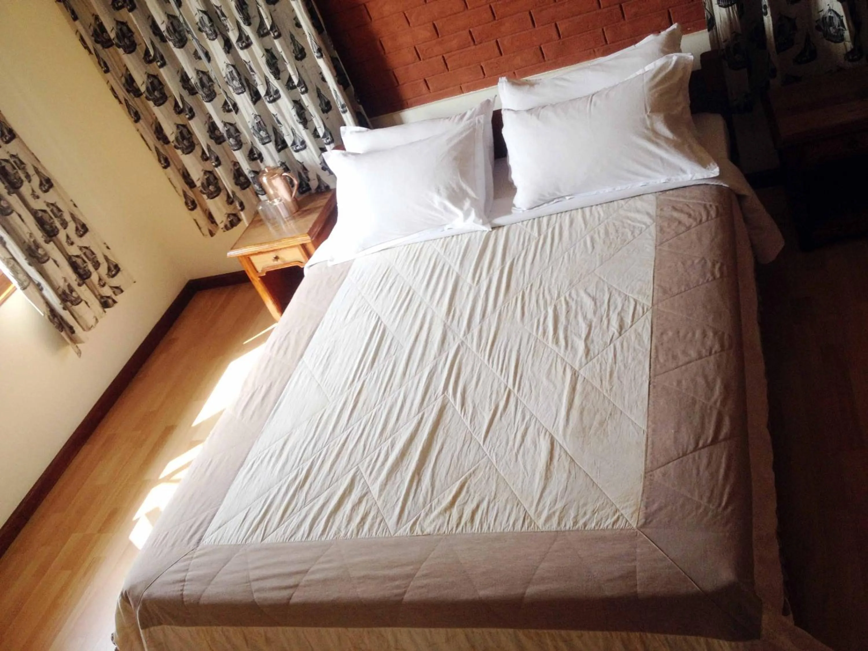 Bed in Vardan Resort n' Apartment