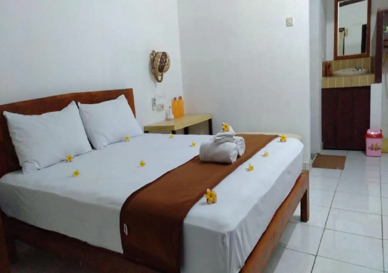 Seating area, Bed in Taman Menjangan by SnorkelingMenjangan