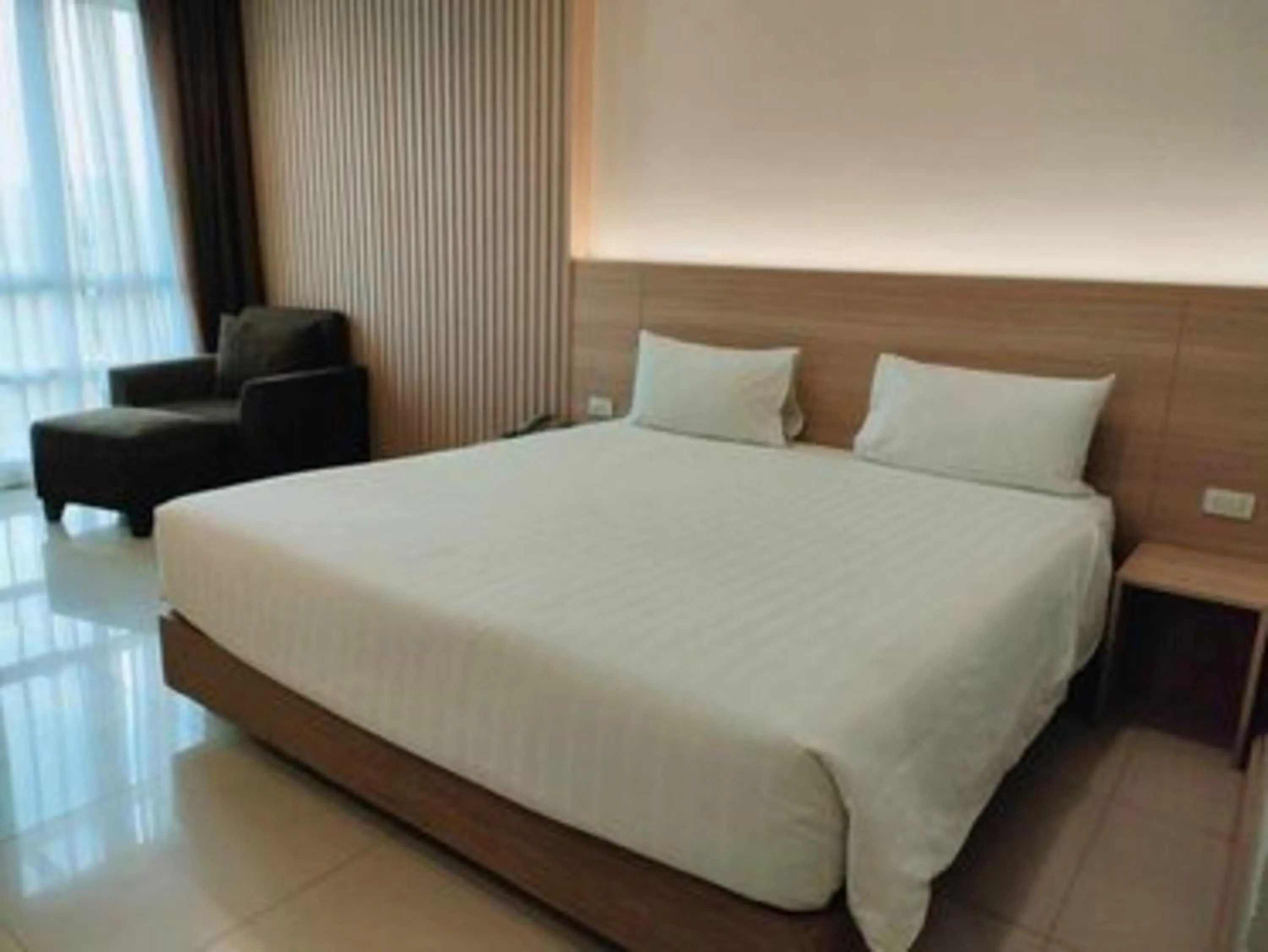 Photo of the whole room, Bed in Crystal Suites Suvarnbhumi Airport