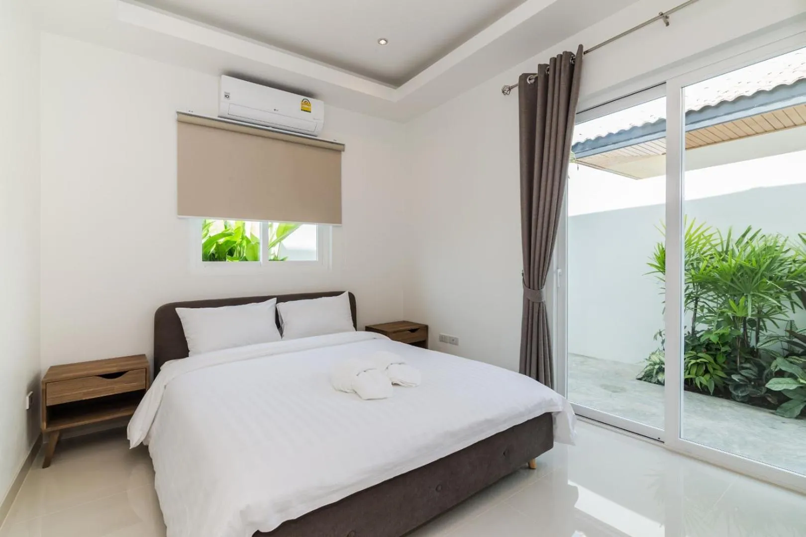 Bed in Orchid Paradise Homes 404