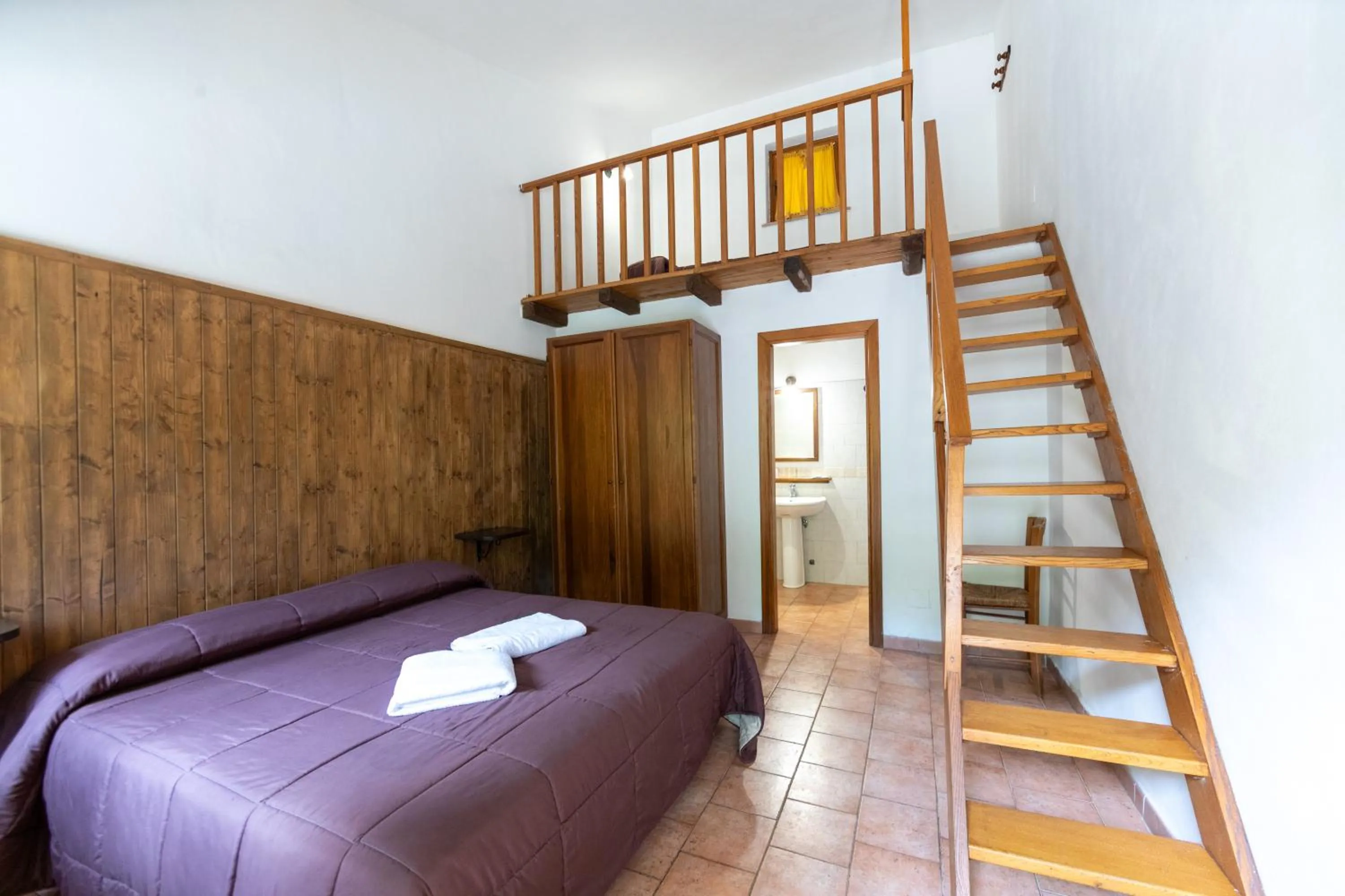 Bed in Agriturismo La Ferrera