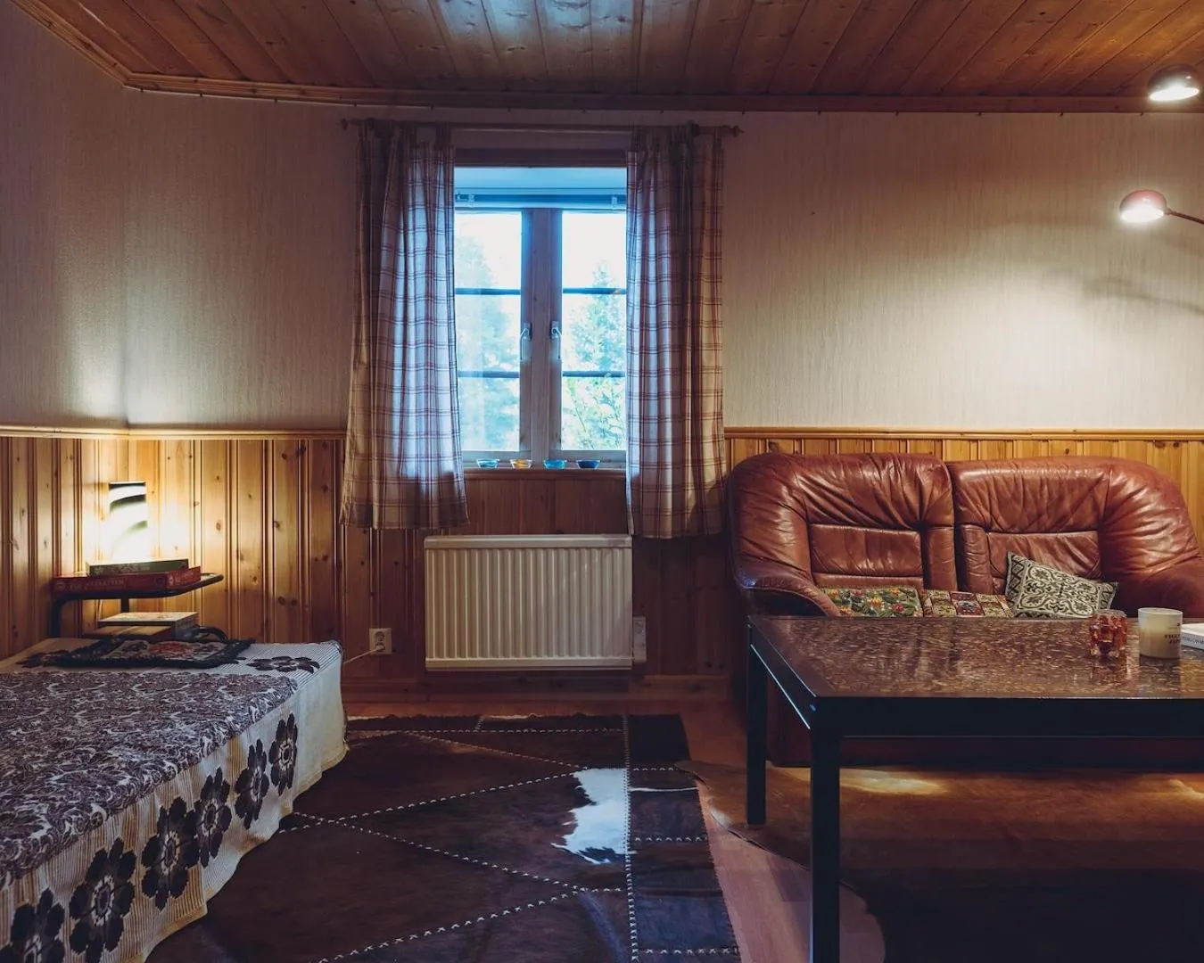 Living room, Bed in Lofsdalens Fjällhotell & Hotellbyns Lägenheter