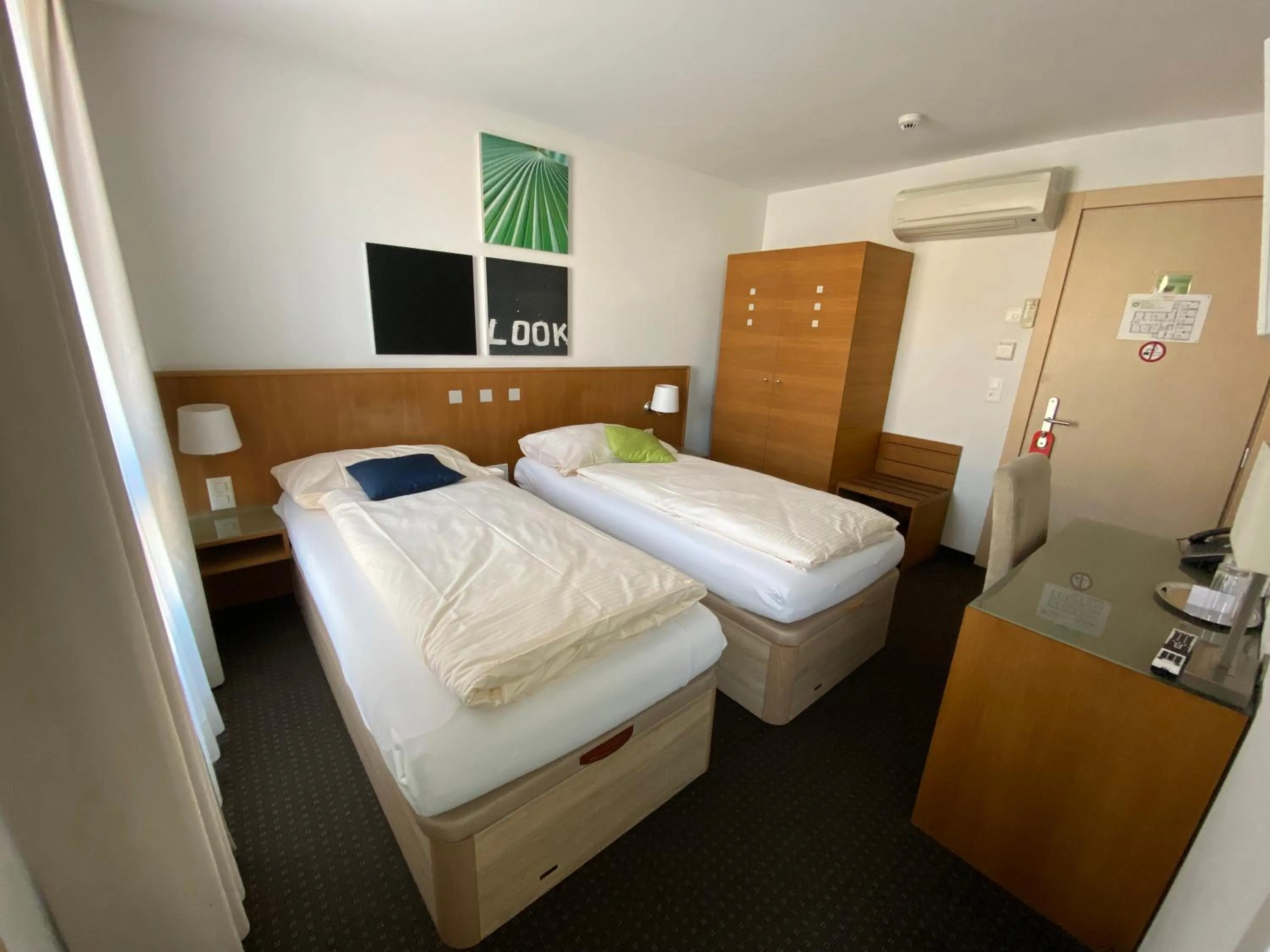 Photo of the whole room, Bed in Businesshotel Lux