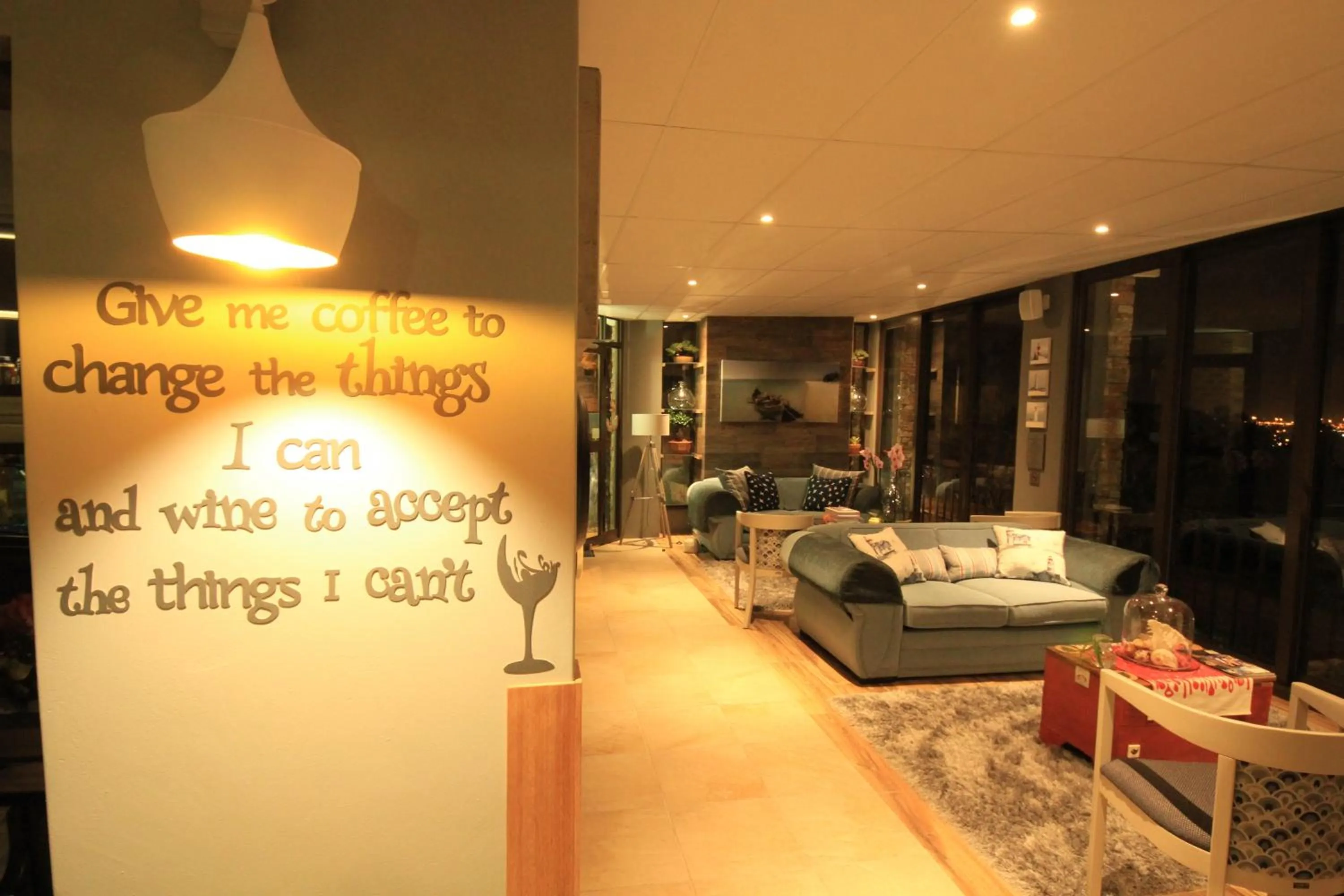 Communal lounge/ TV room in Bay View Guest House