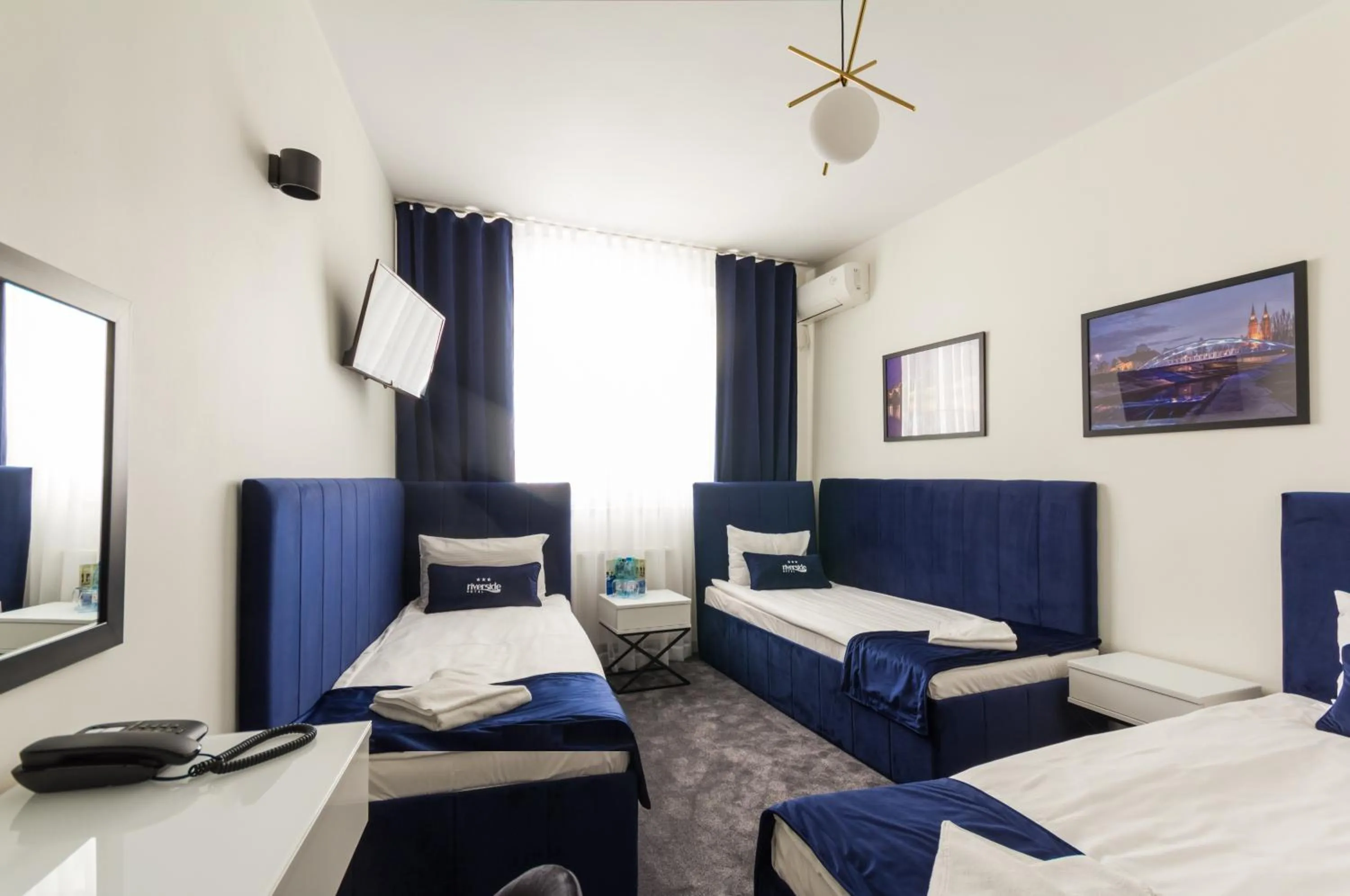 Bed in Riverside Hotel