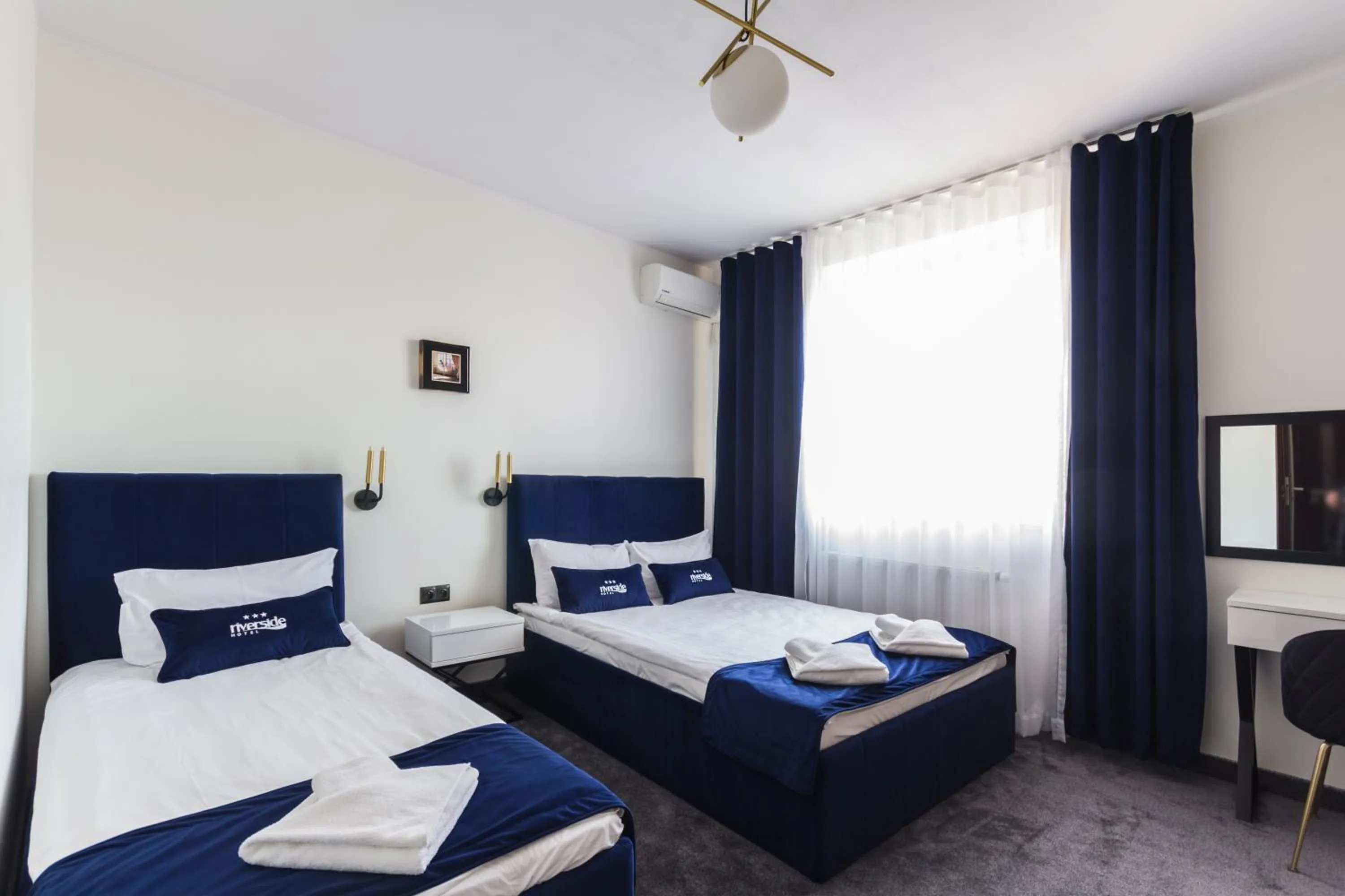 Bed in Riverside Hotel