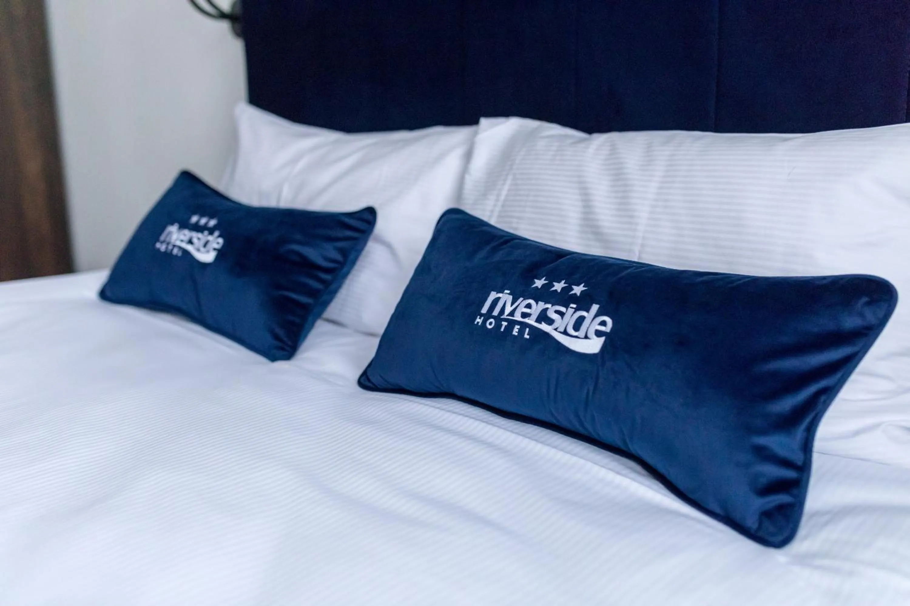 Bed in Riverside Hotel