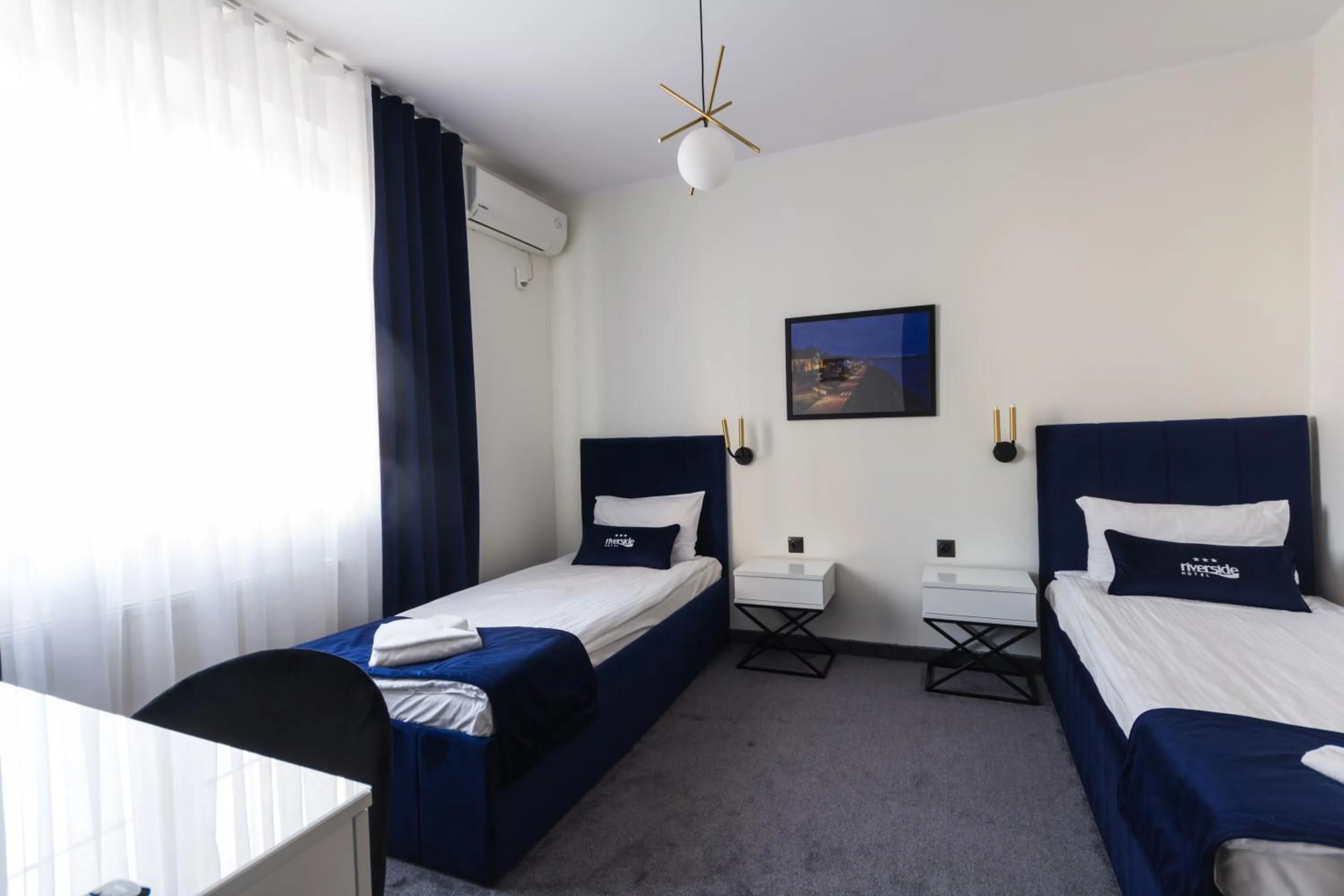 Bed in Riverside Hotel