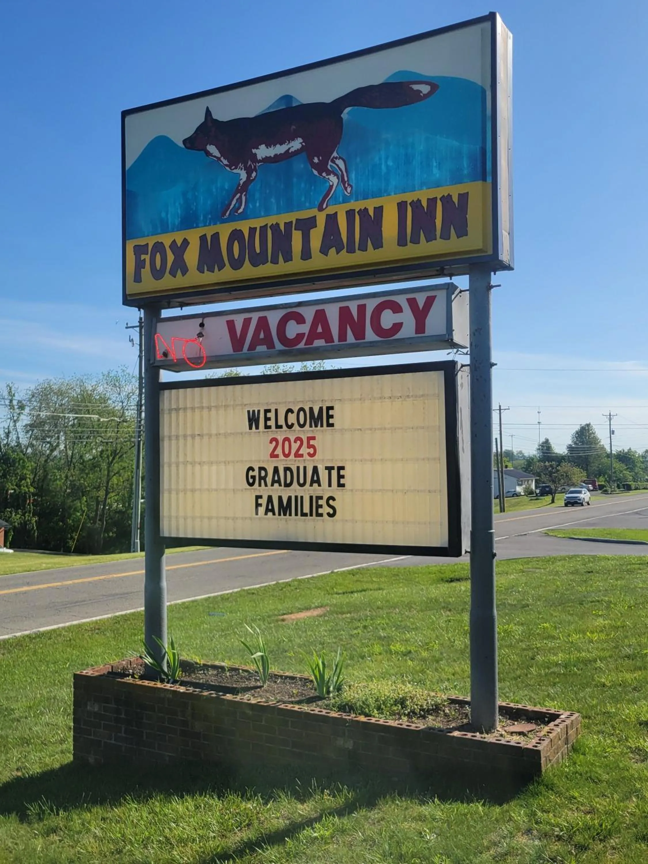 Property logo or sign in Fox Mountain Inn