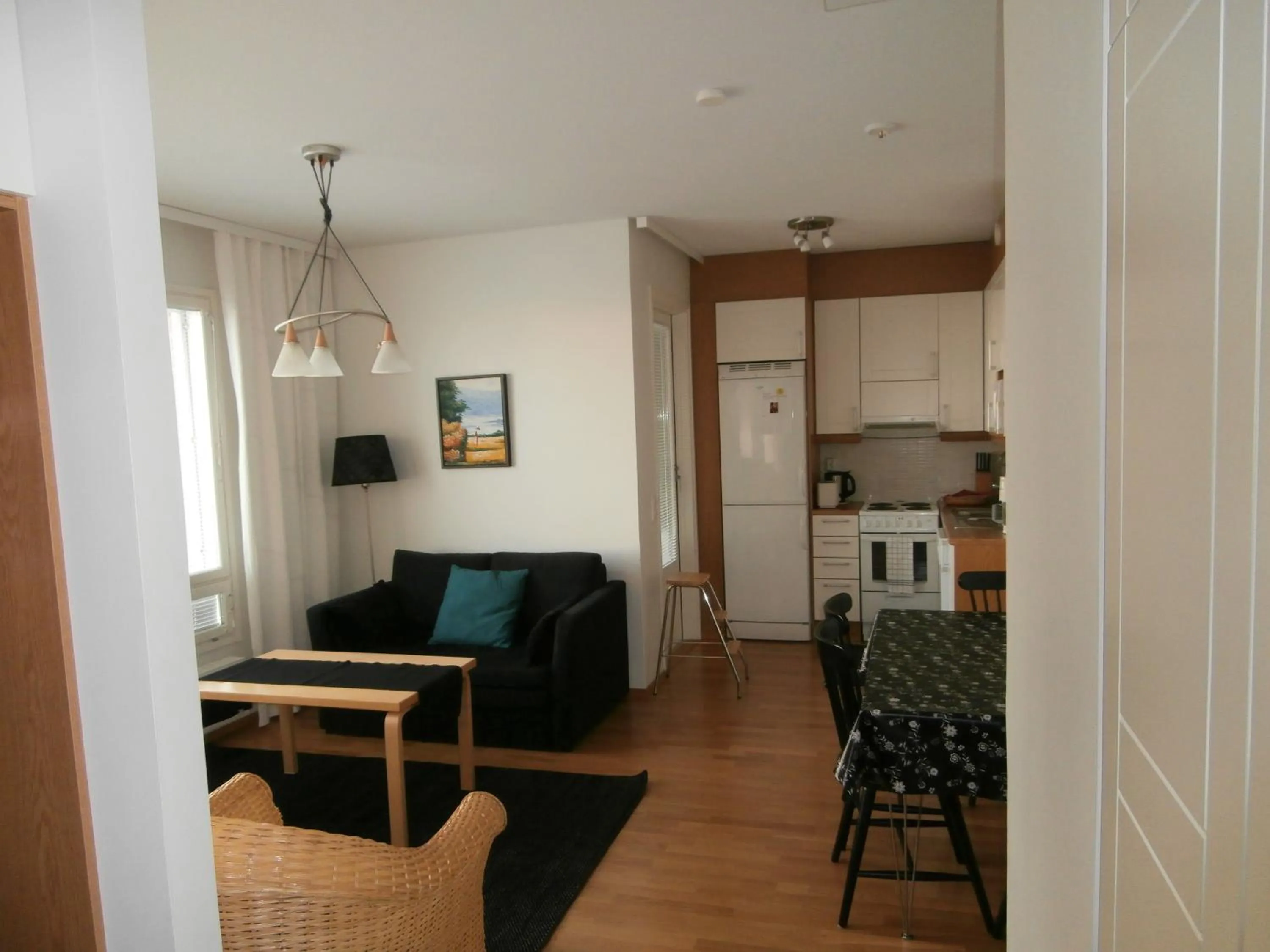 Photo of the whole room in Huoneistohotelli Nallisuites