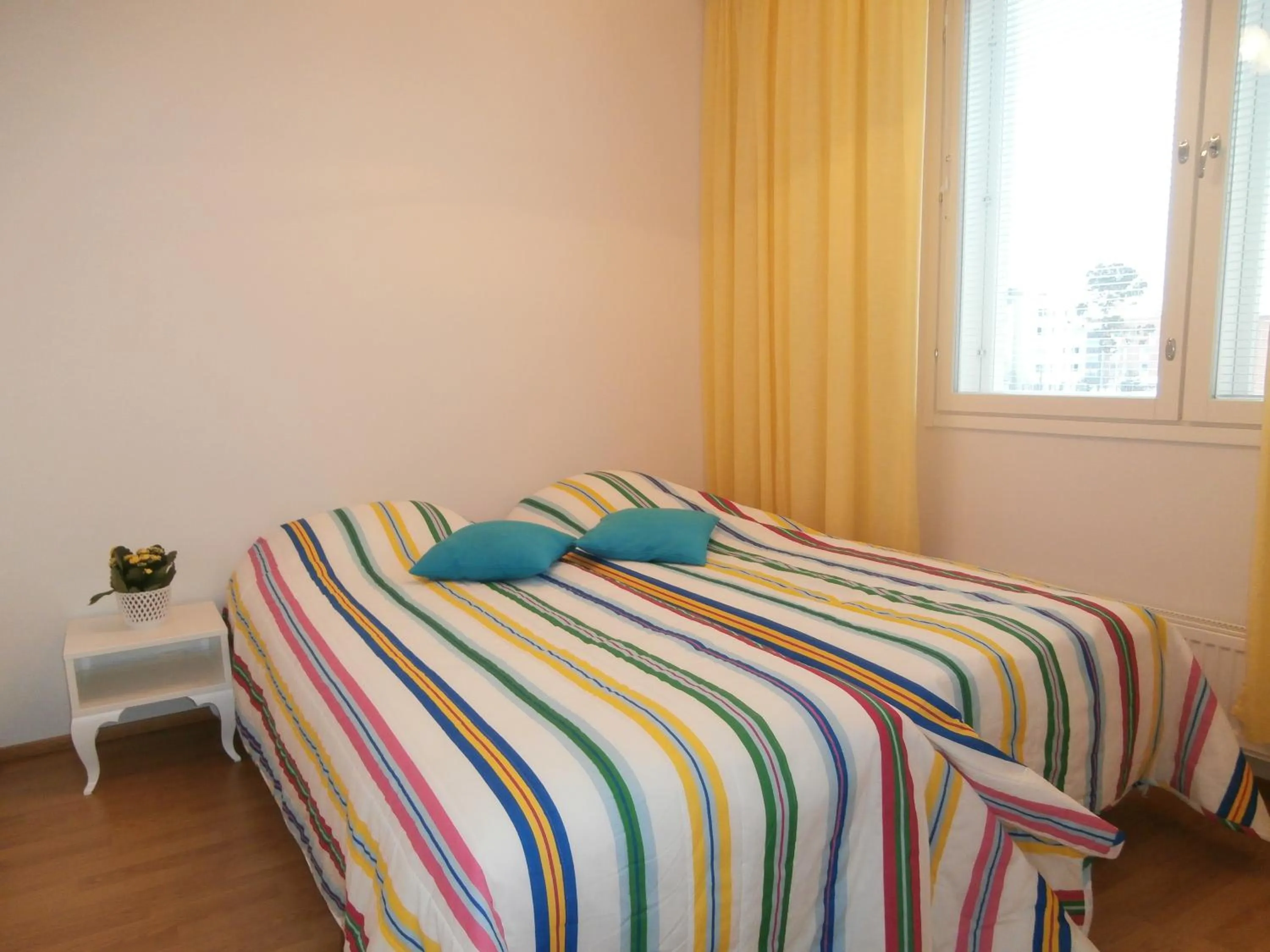 Bed in Huoneistohotelli Nallisuites