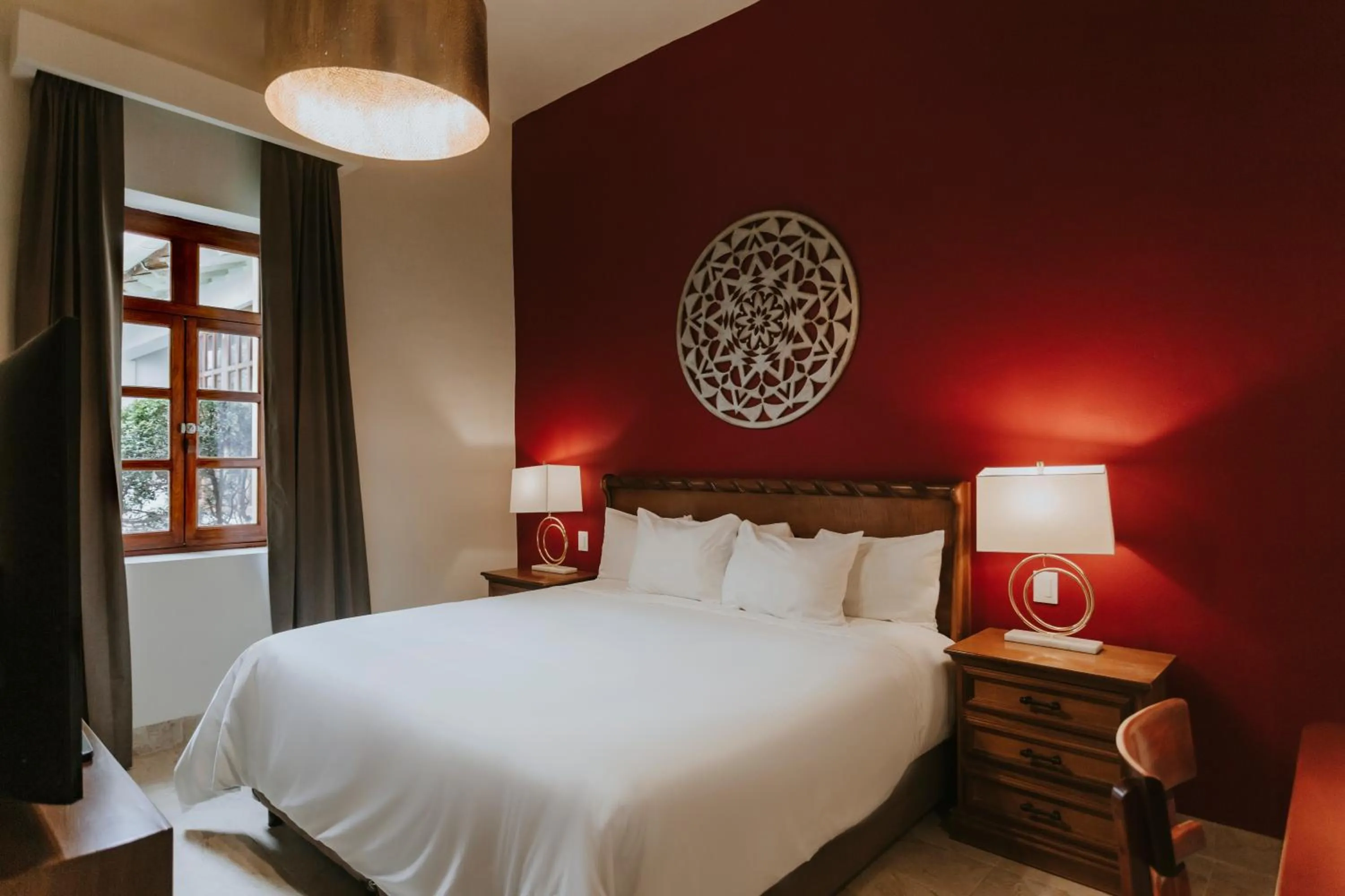 Bed in Dos Patios Querétaro Curamoria Collection