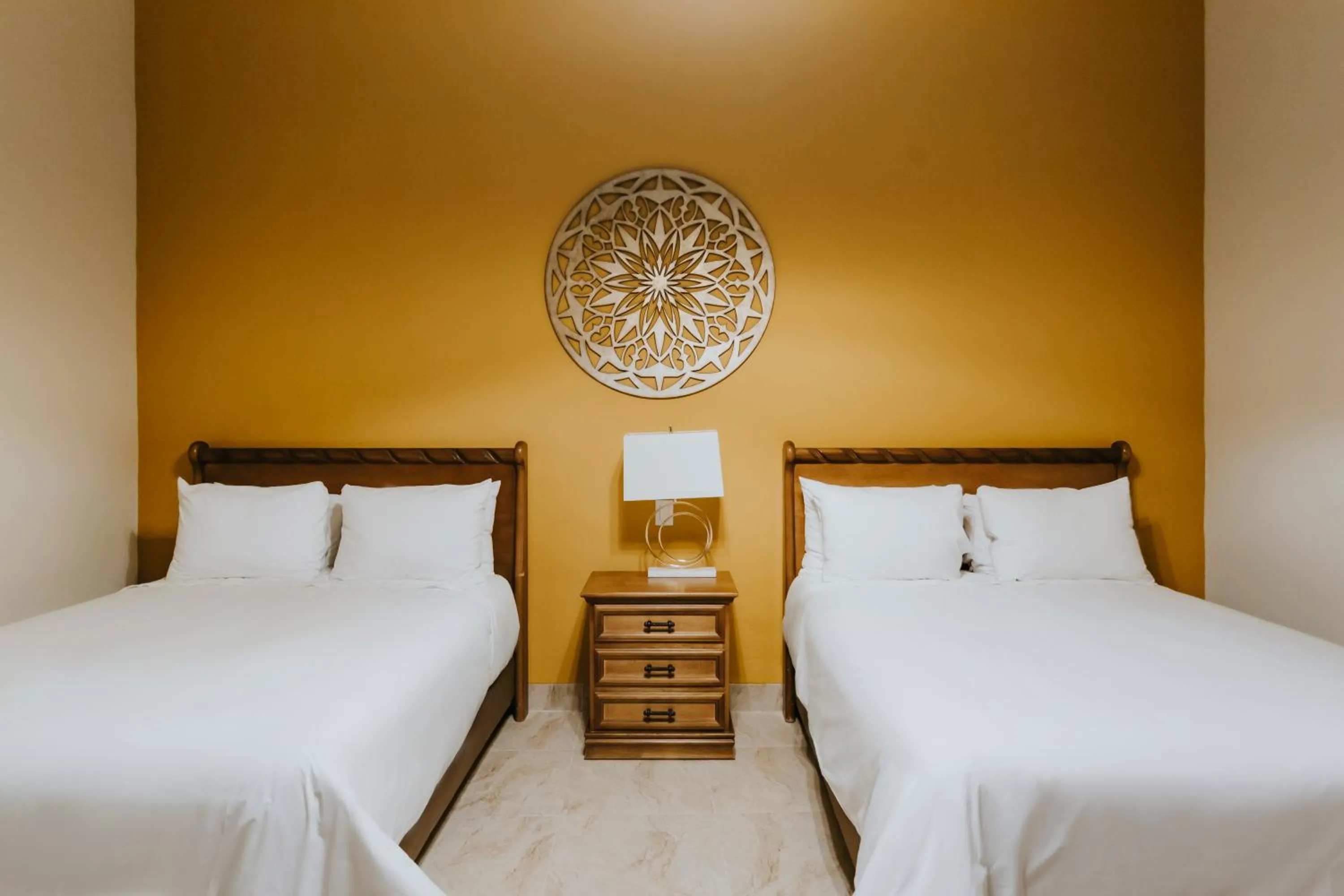 Bed in Dos Patios Querétaro Curamoria Collection