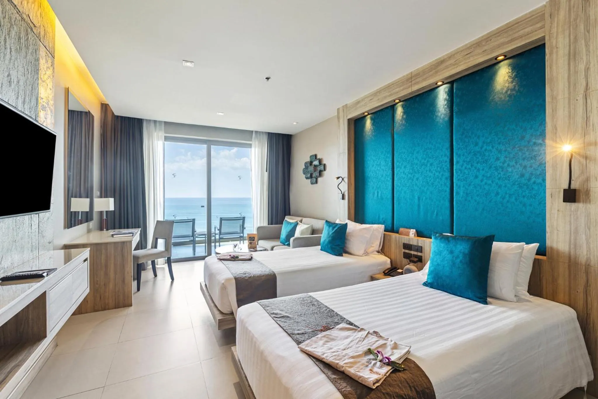 Bed in Cape Sienna Phuket Gourmet Hotel & Villas - SHA Extra Plus