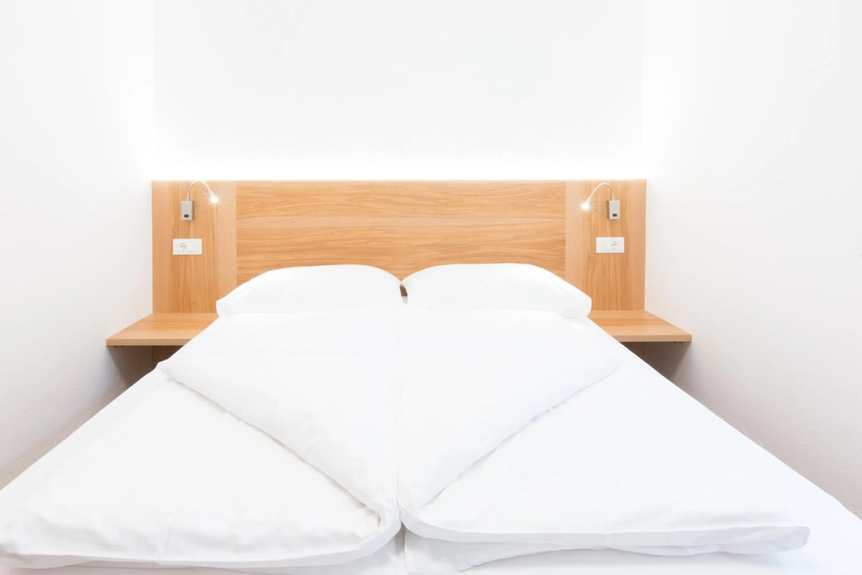 Bed in Hotel Appartement Inge