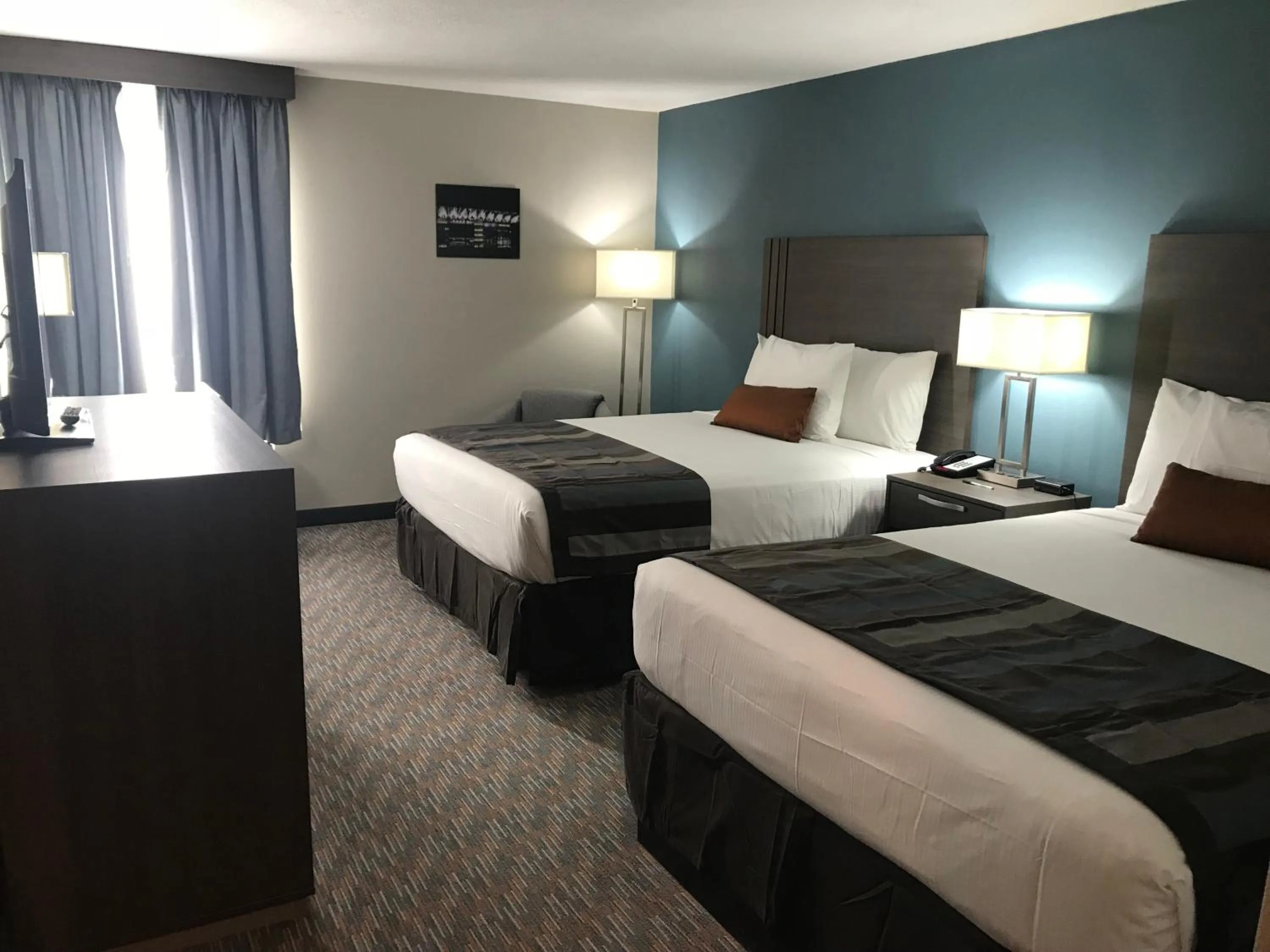 Bedroom, Bed in Nobile Hotel Parkway at Celebration Orlando Very Close to Disney Theme Parks