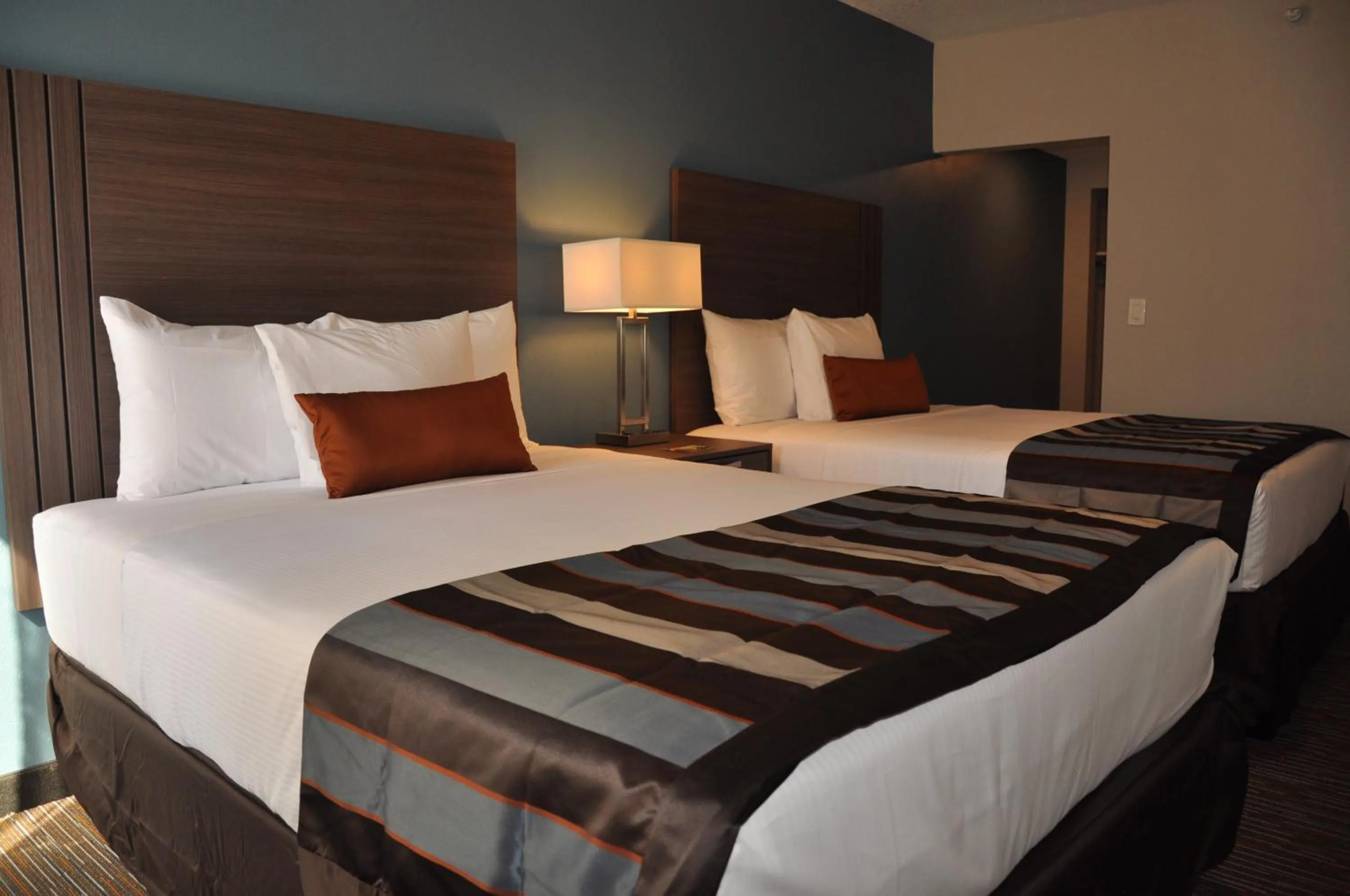 Bedroom, Bed in Nobile Hotel Parkway at Celebration Orlando Very Close to Disney Theme Parks