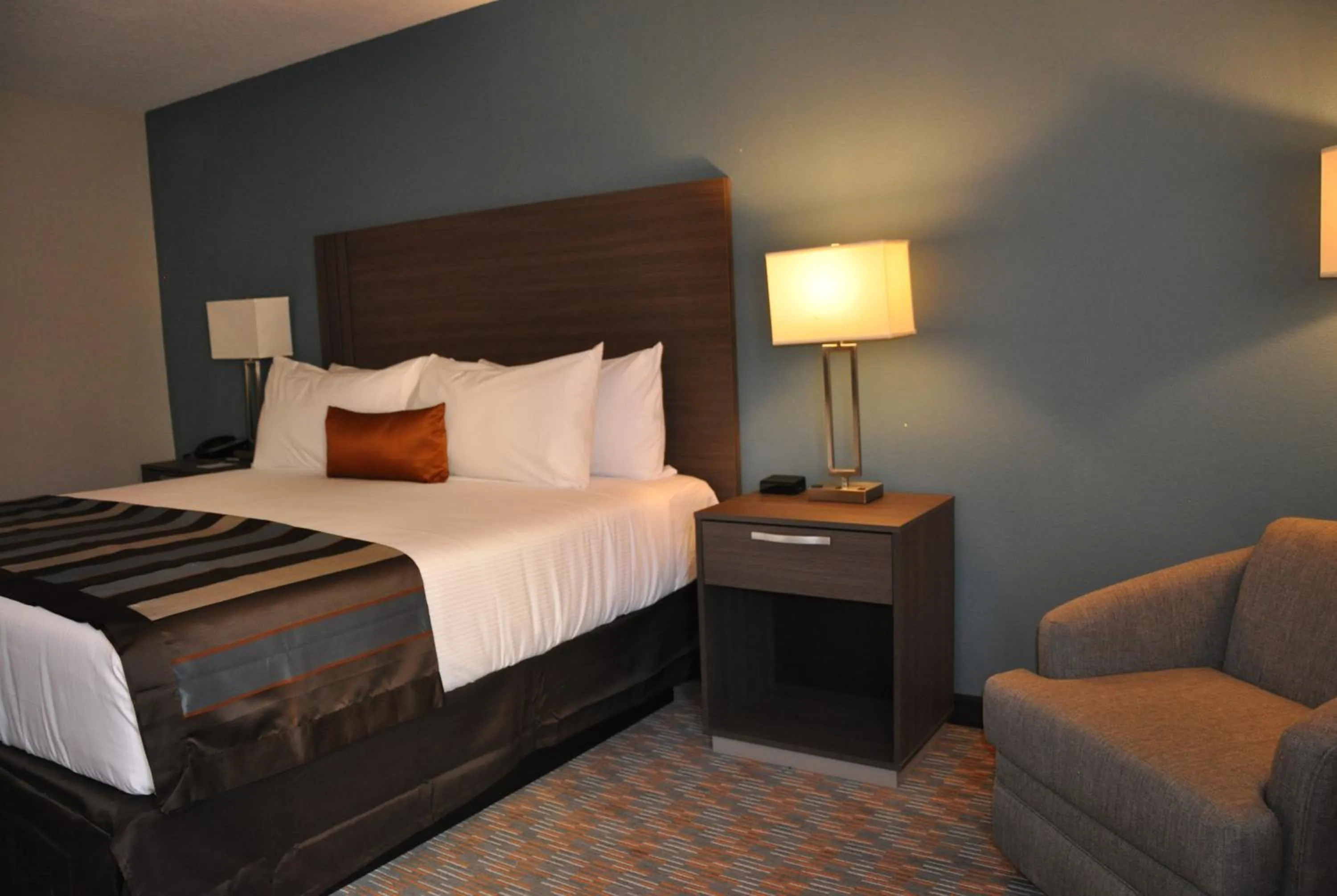 Bedroom, Bed in Nobile Hotel Parkway at Celebration Orlando Very Close to Disney Theme Parks