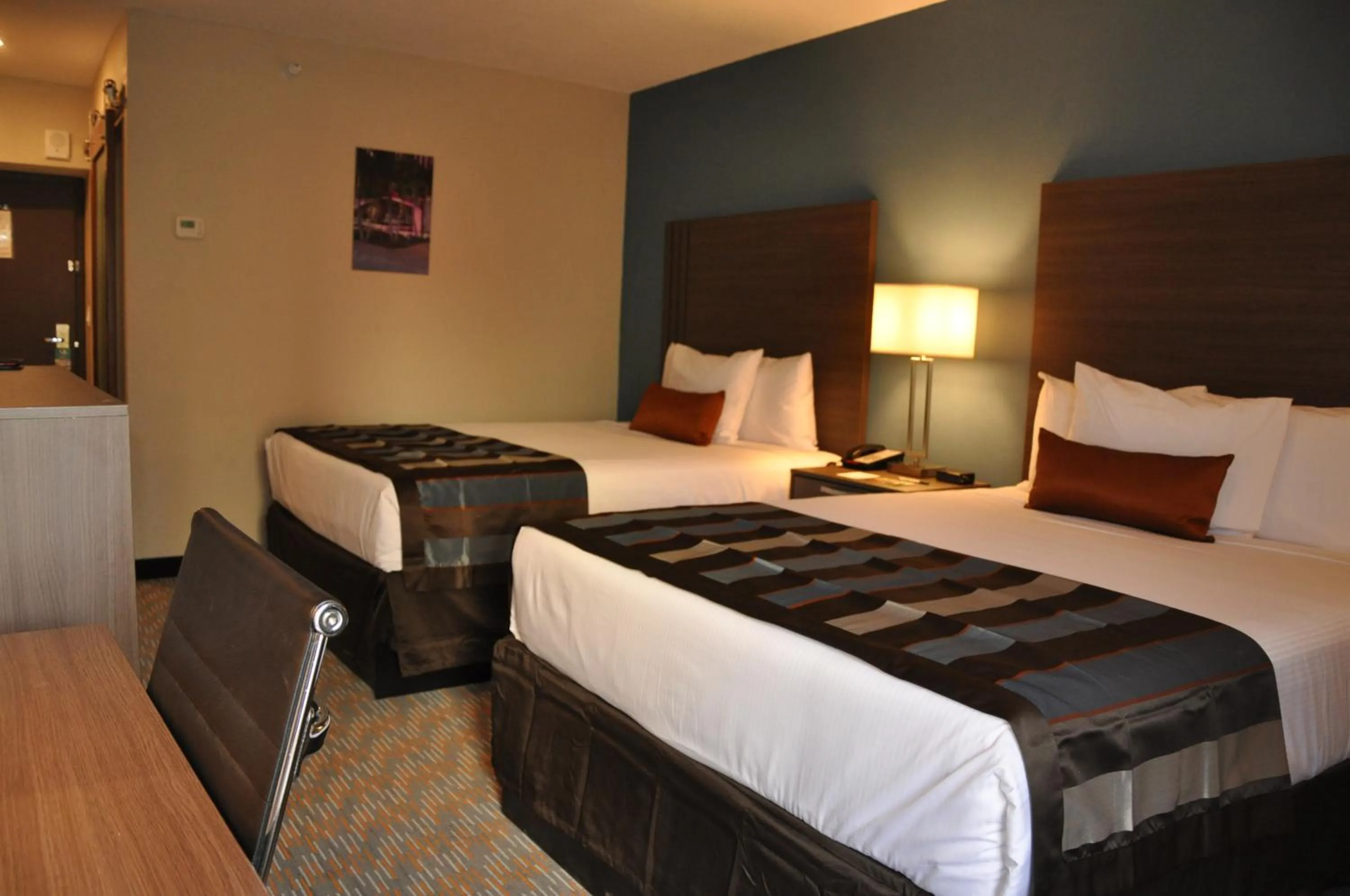 Bedroom, Bed in Nobile Hotel Parkway at Celebration Orlando Very Close to Disney Theme Parks