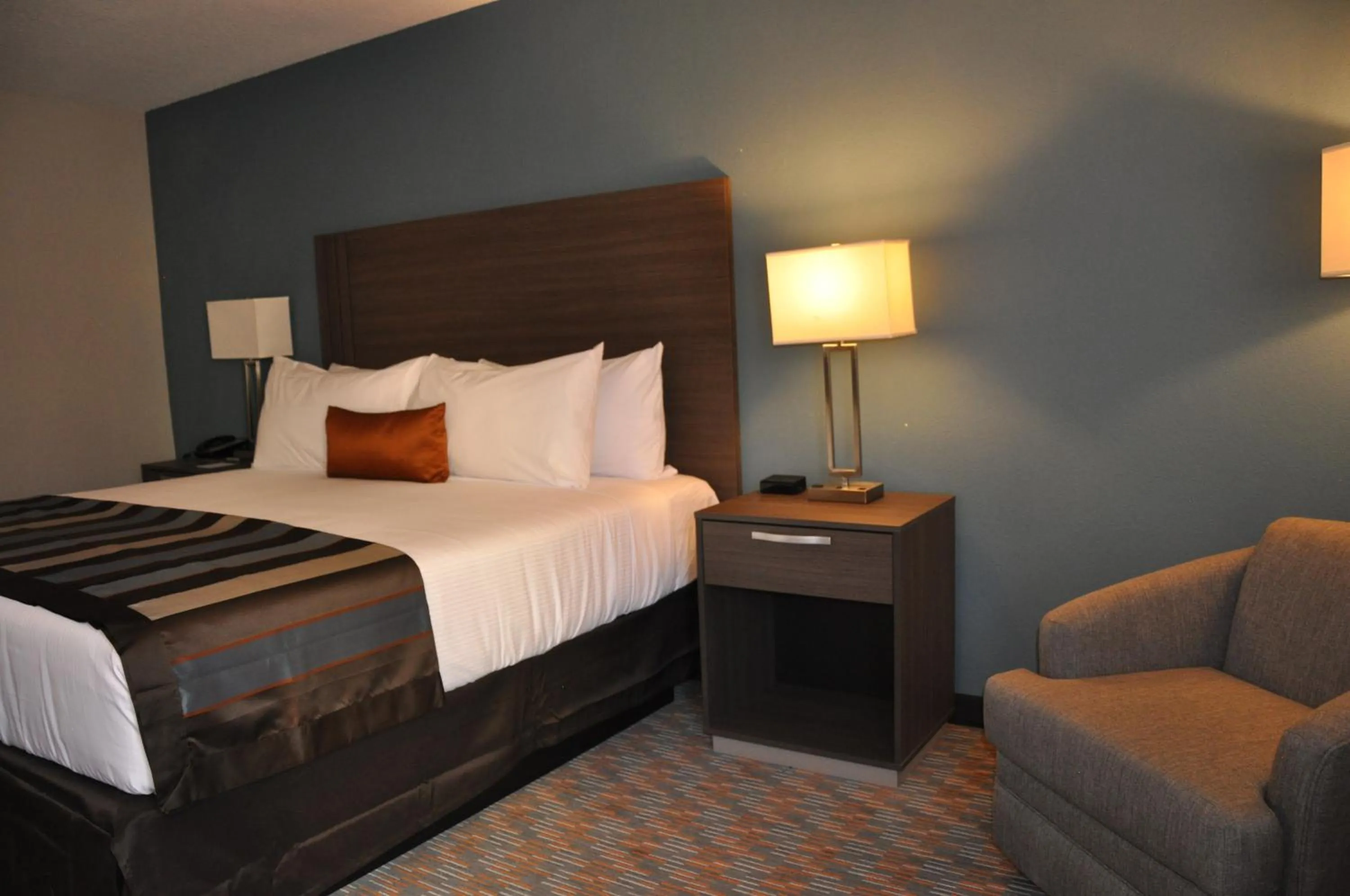 Bedroom, Bed in Nobile Hotel Parkway at Celebration Orlando Very Close to Disney Theme Parks
