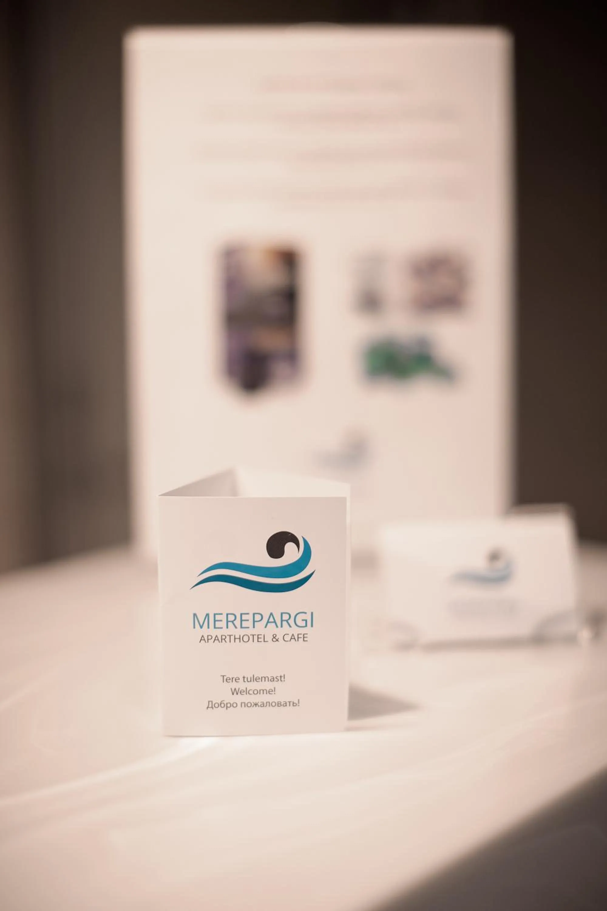 Property logo or sign in Merepargi ApartHotel & Cafe