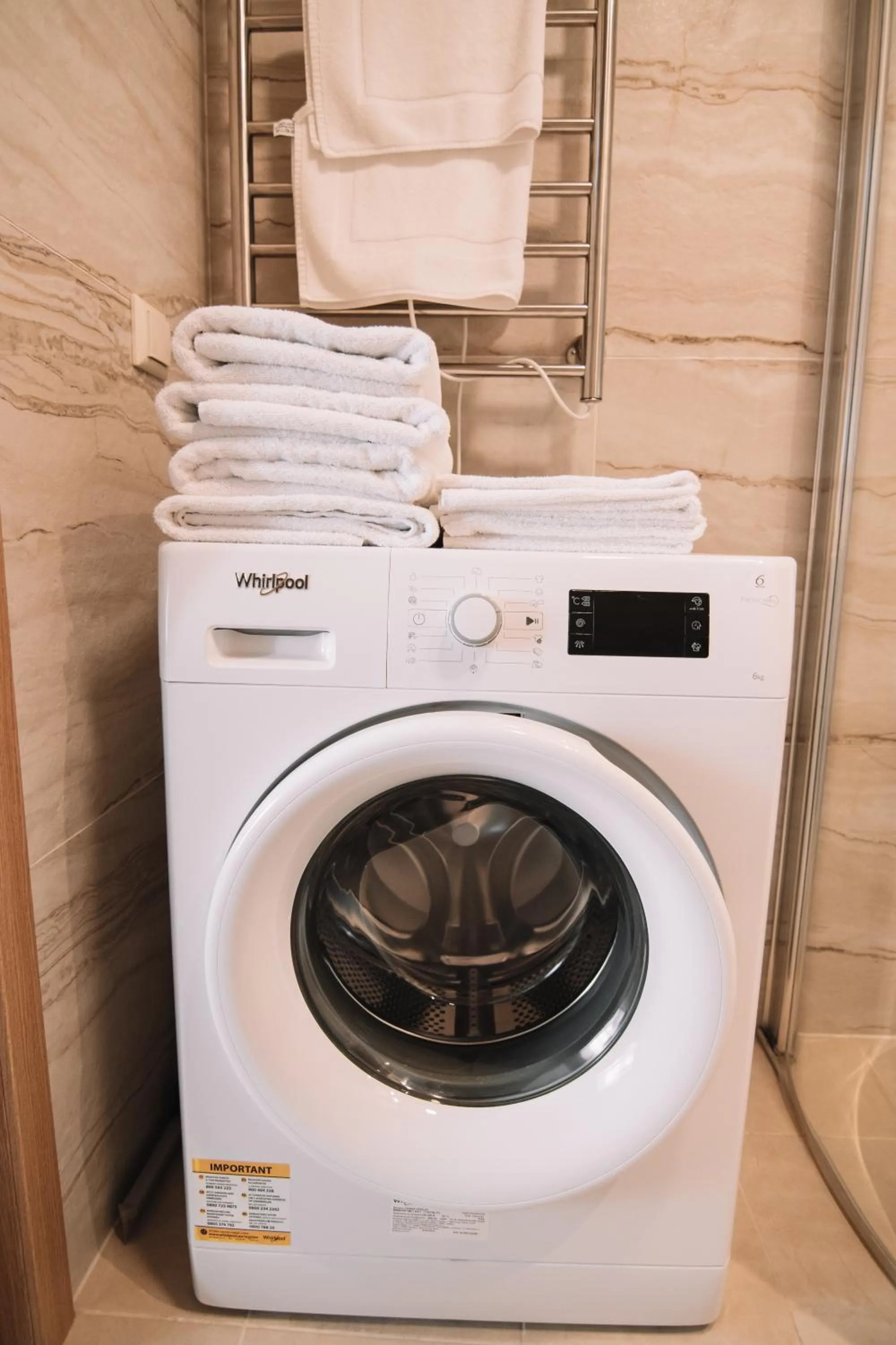 towels in Merepargi ApartHotel & Cafe