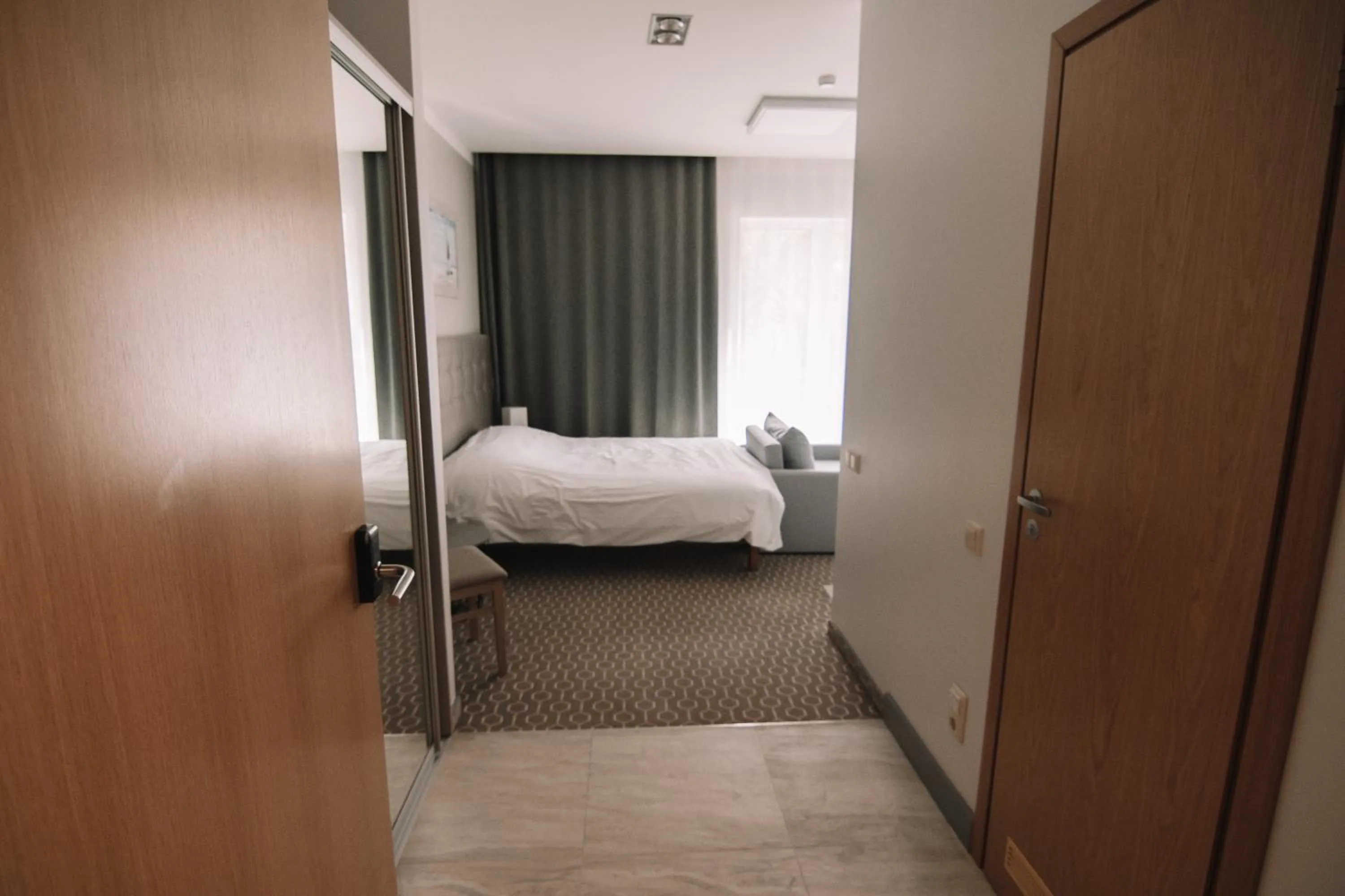 Bed in Merepargi ApartHotel & Cafe