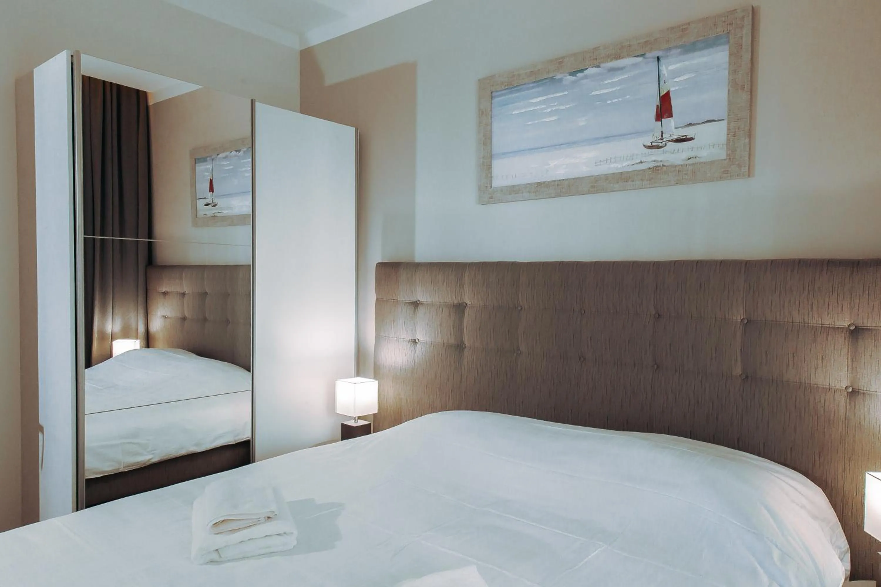 Bed in Merepargi ApartHotel & Cafe