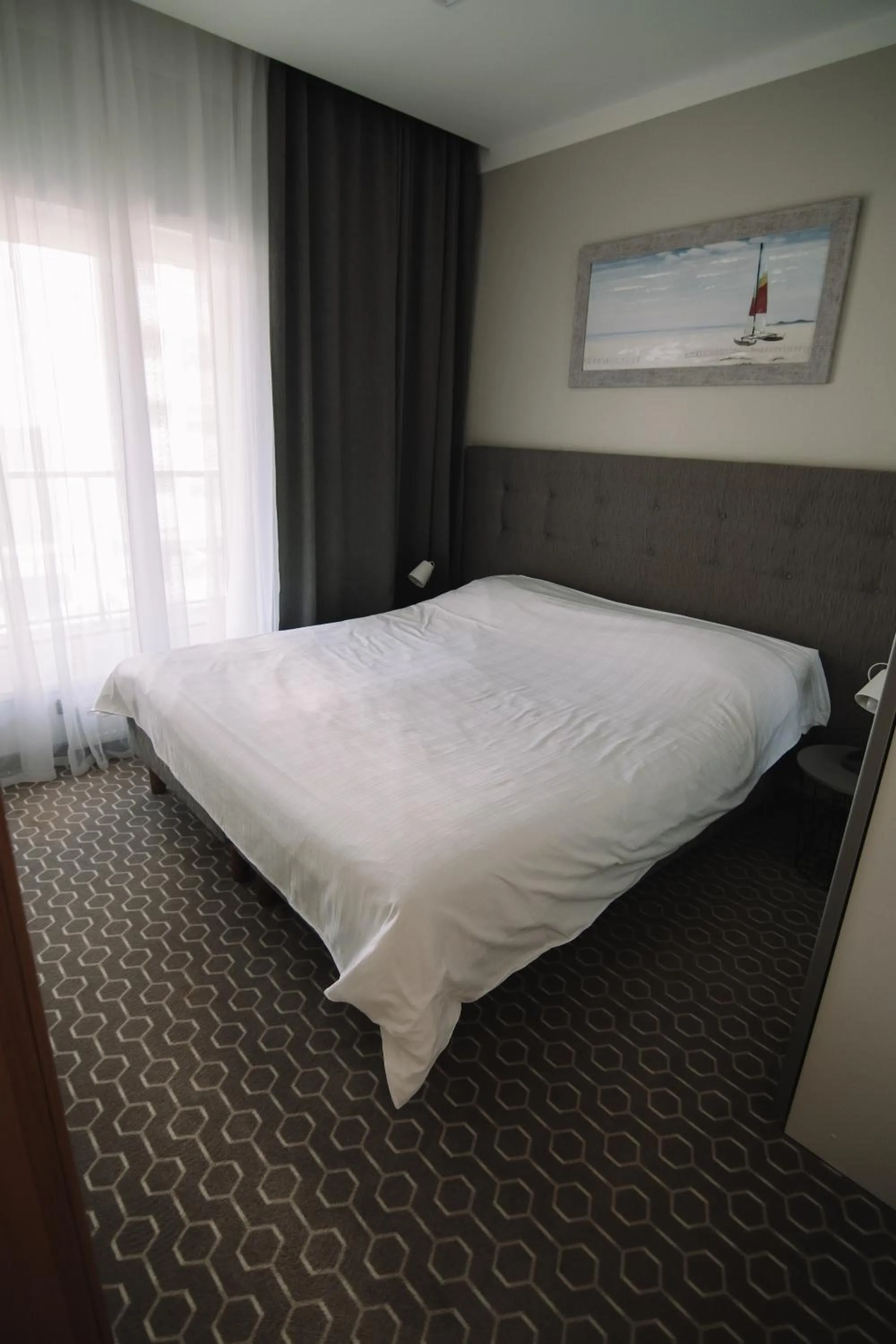 Bed in Merepargi ApartHotel & Cafe