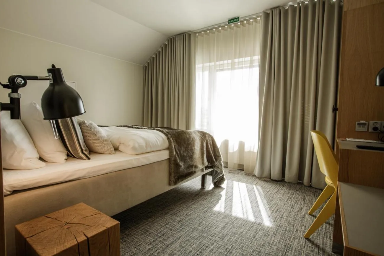 Photo of the whole room, Bed in Hämeenkylän Kartano