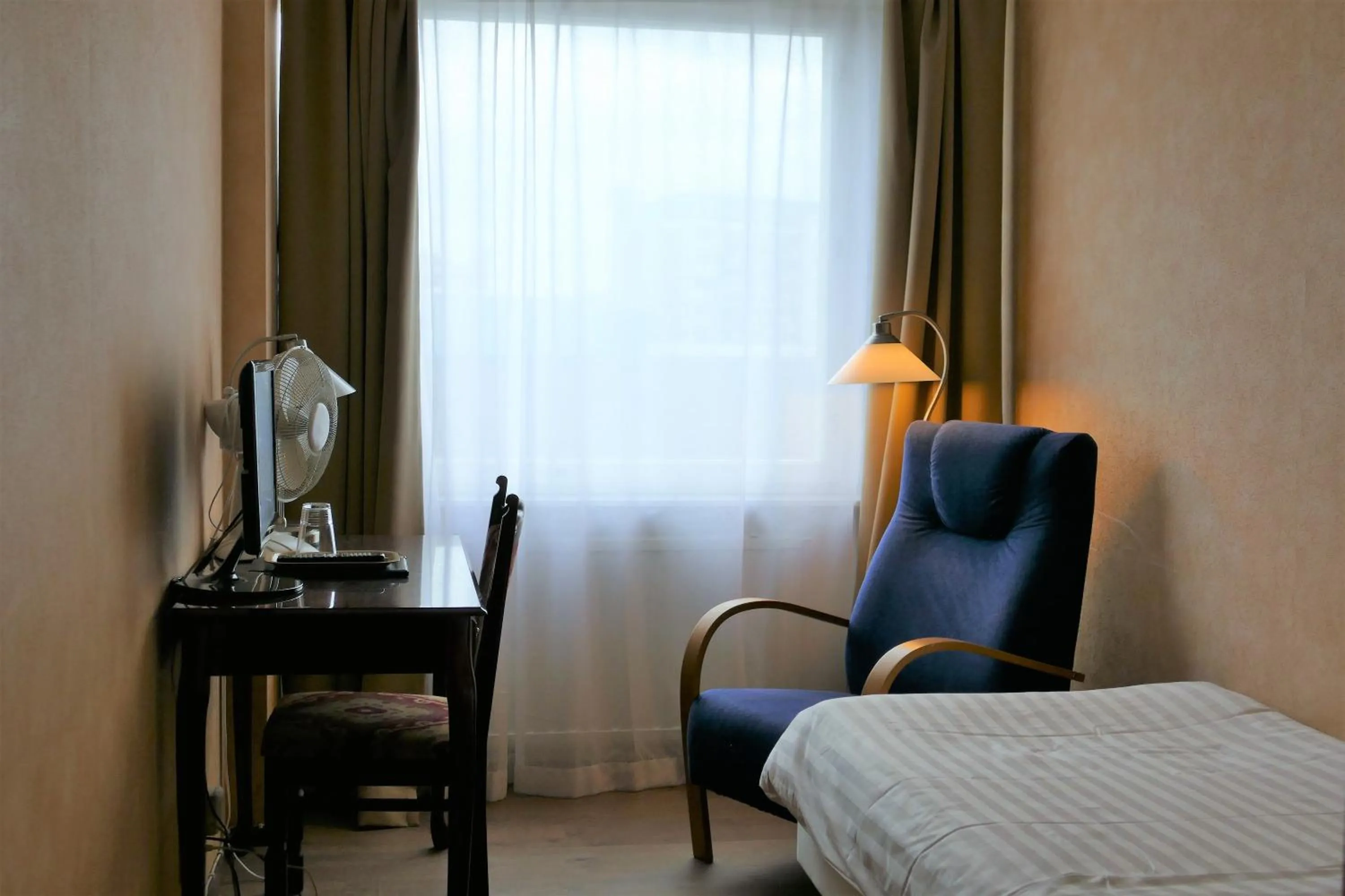 Bed in Linnanpiha Bed & Breakfast