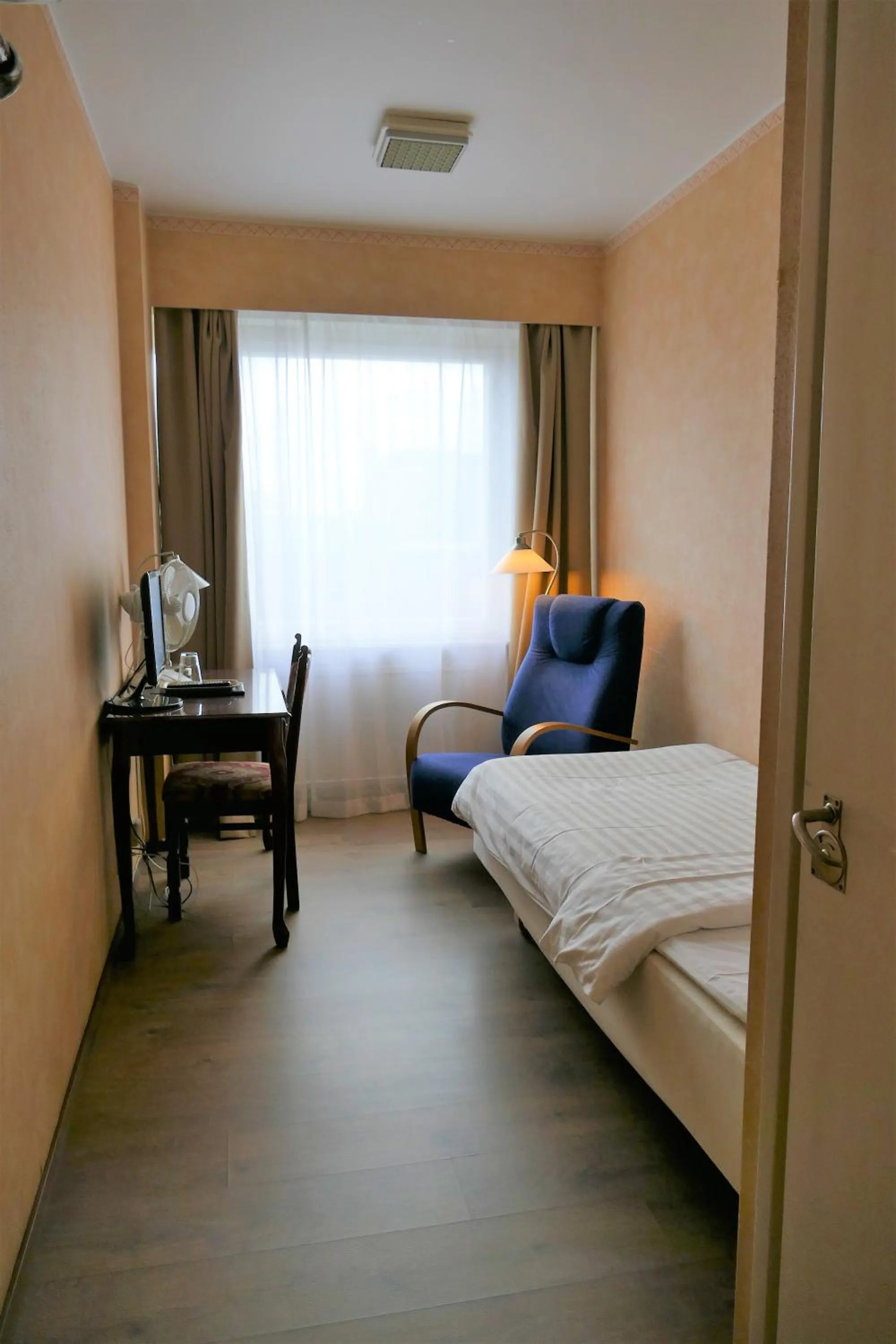 Bed in Linnanpiha Bed & Breakfast