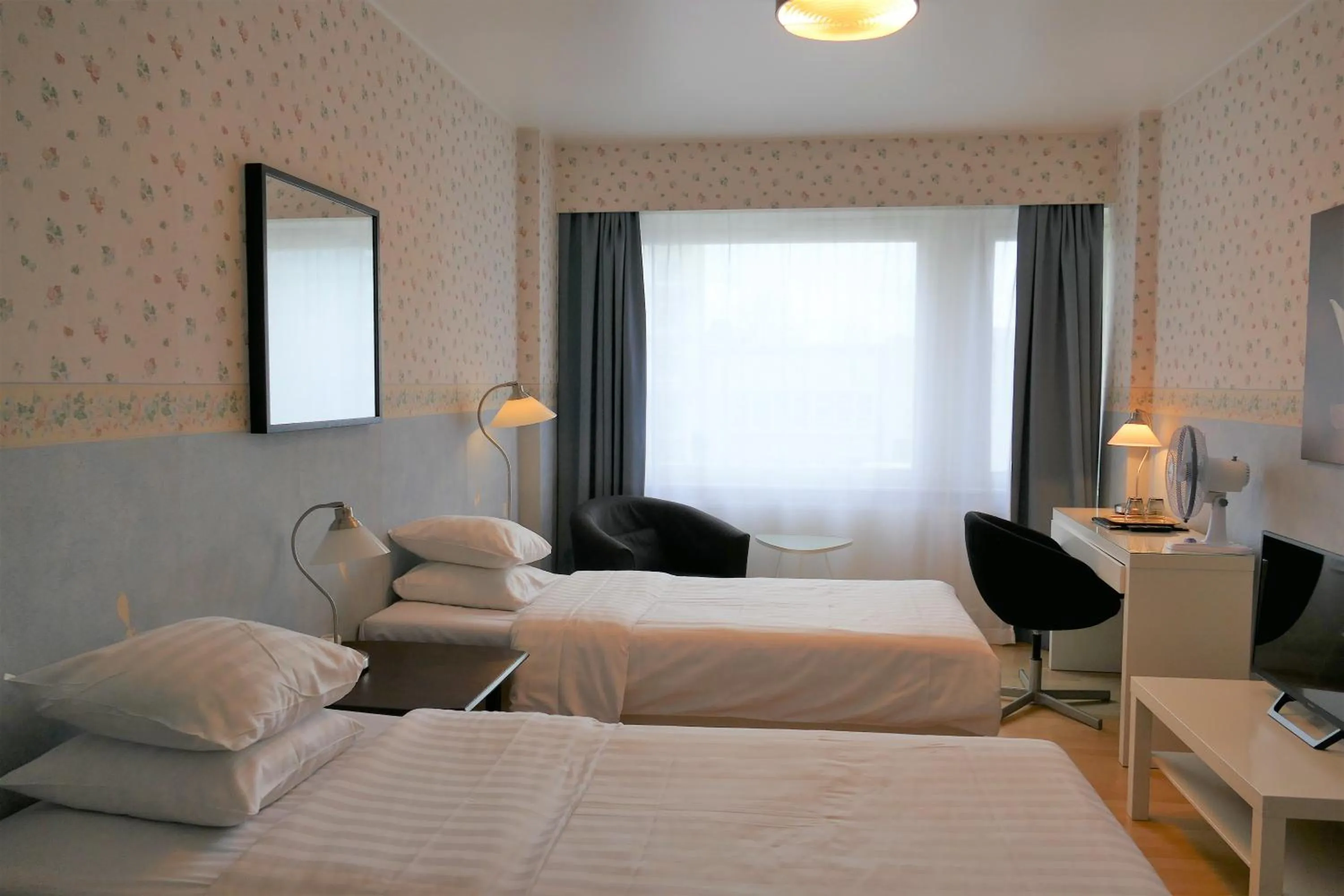 Bed in Linnanpiha Bed & Breakfast