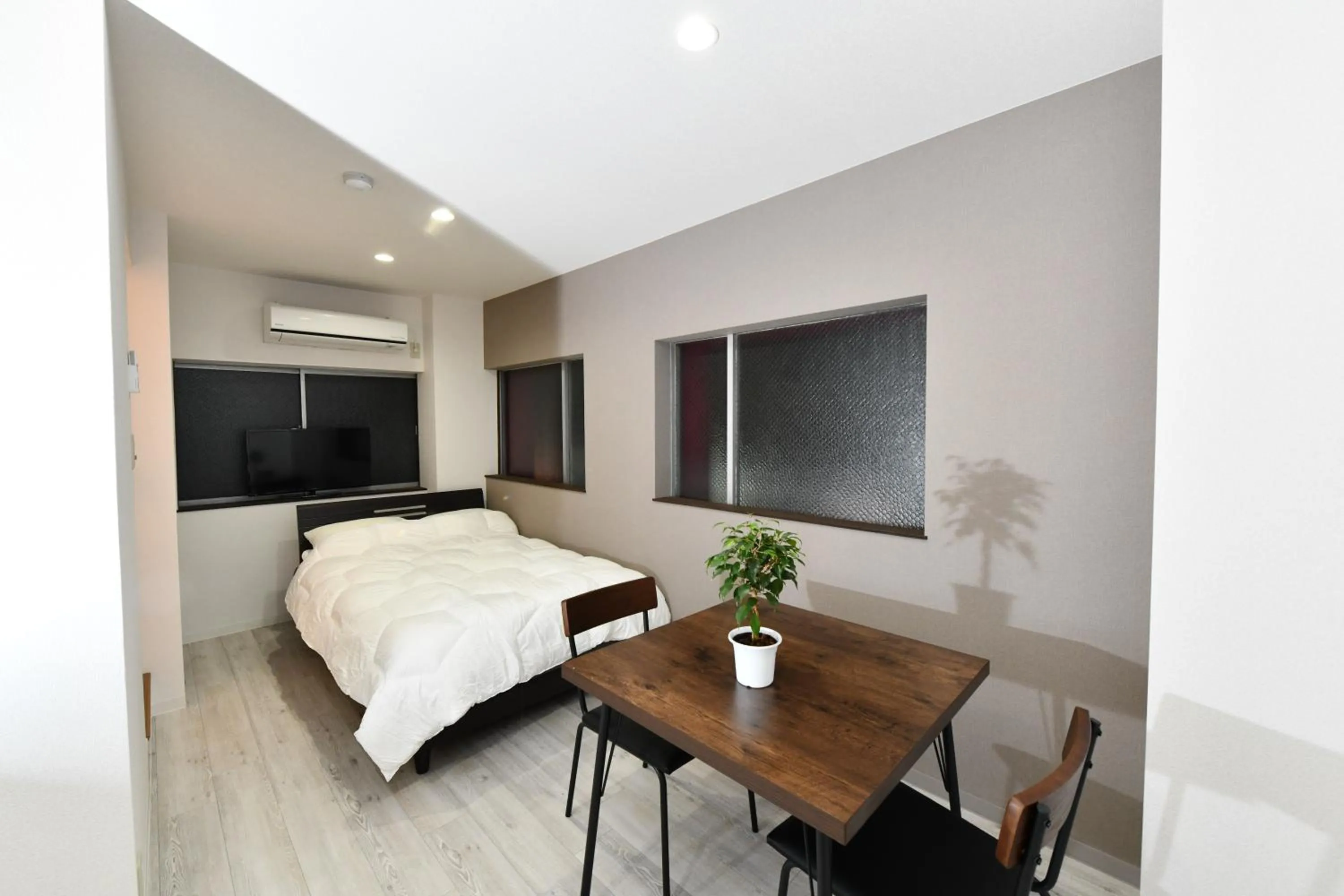 Bed in Suzumaru Hotel