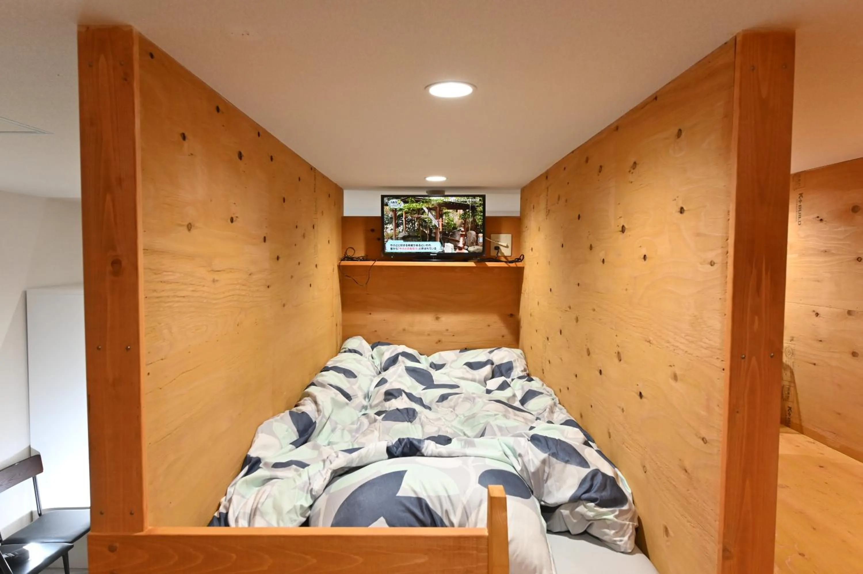 Bed in Suzumaru Hotel