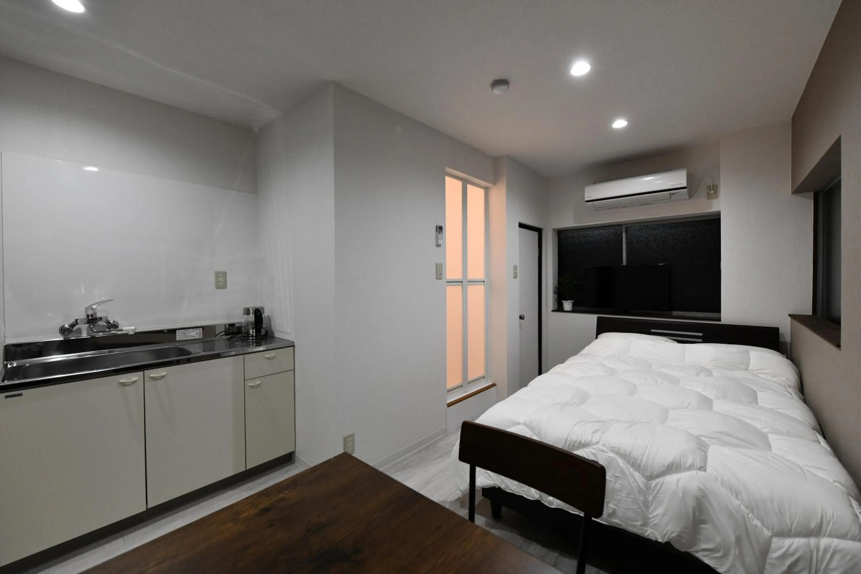 Bed in Suzumaru Hotel