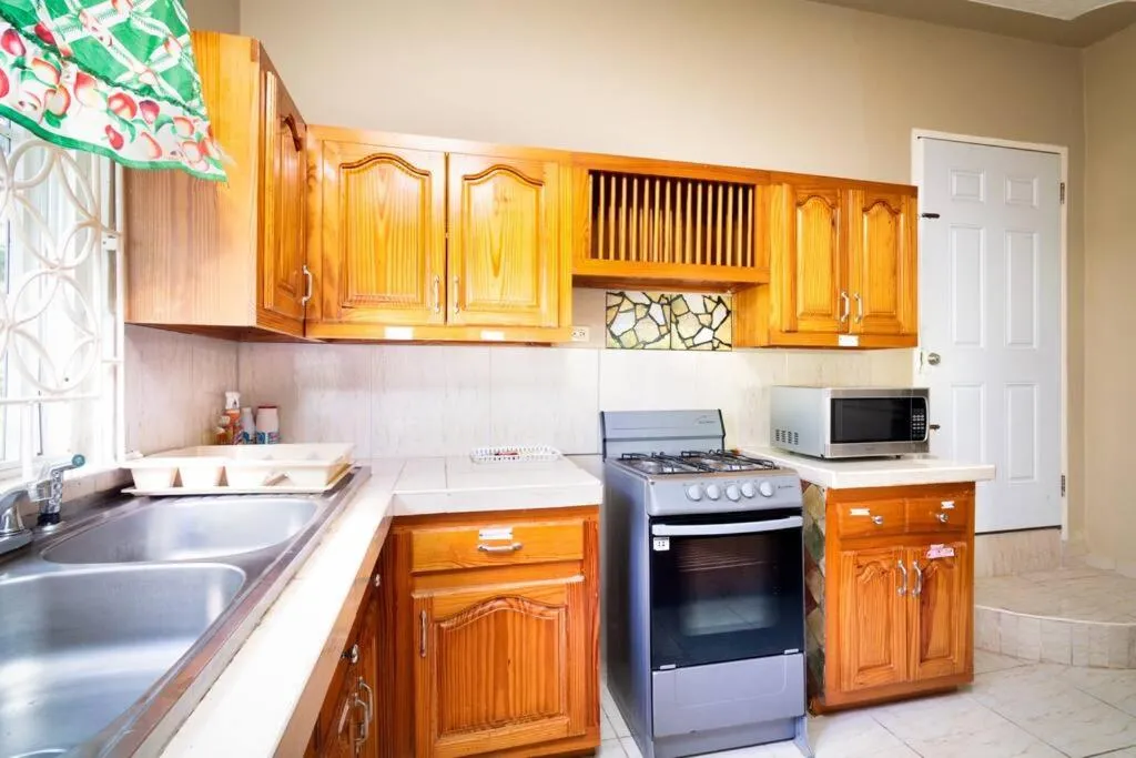 Kitchen or kitchenette in Cozy Locale - Gold