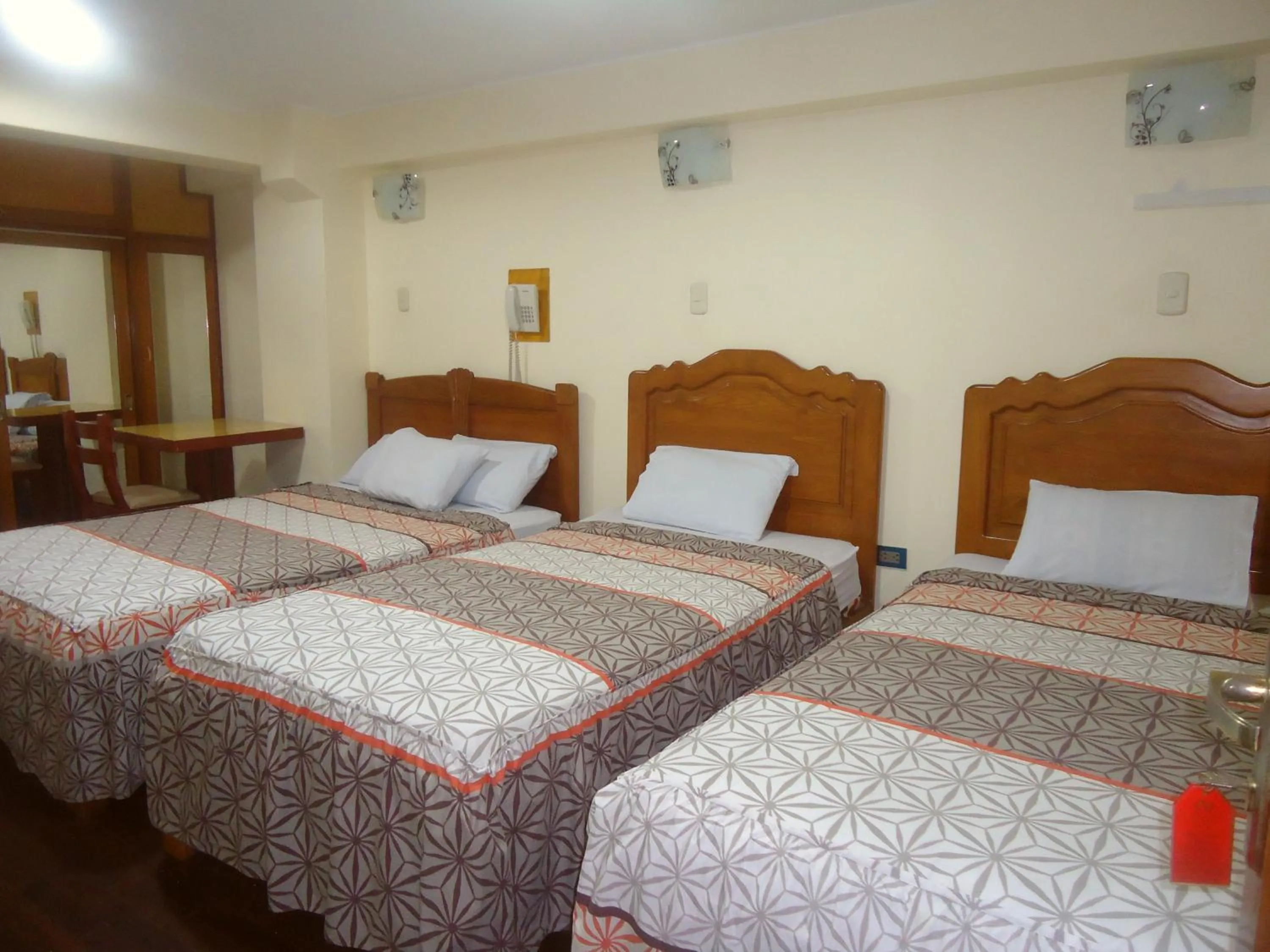 Bed in Hotel Panamericano