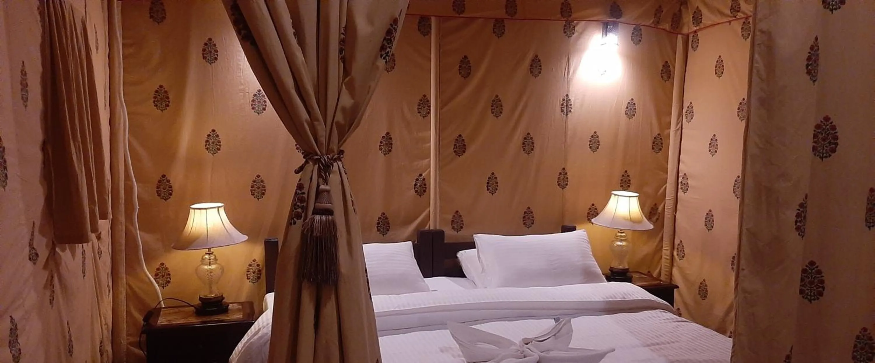 Bed in Lohana Village Resort