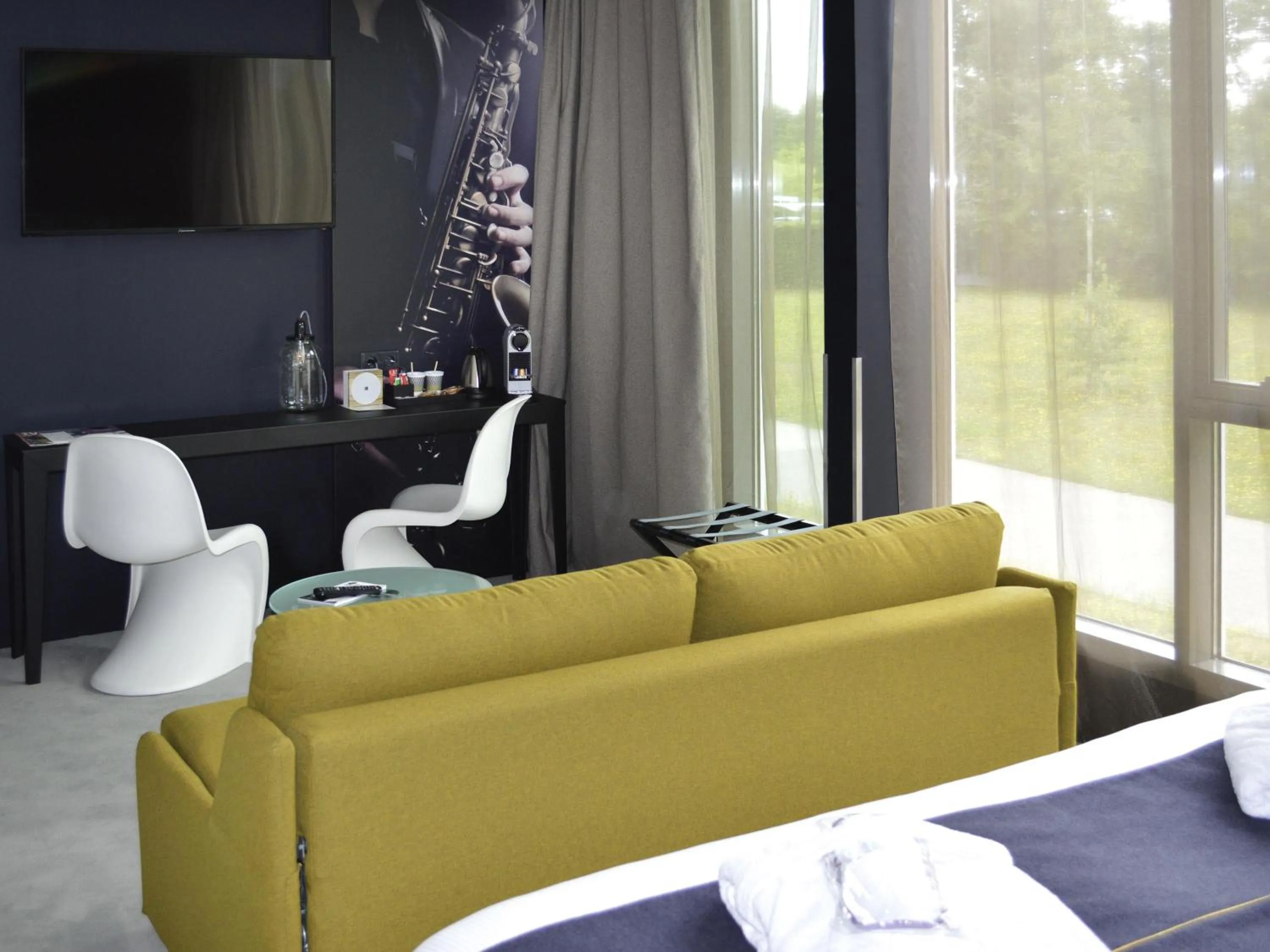 Bedroom in Hôtel Mercure Nantes Ouest Saint-Herblain Zenith