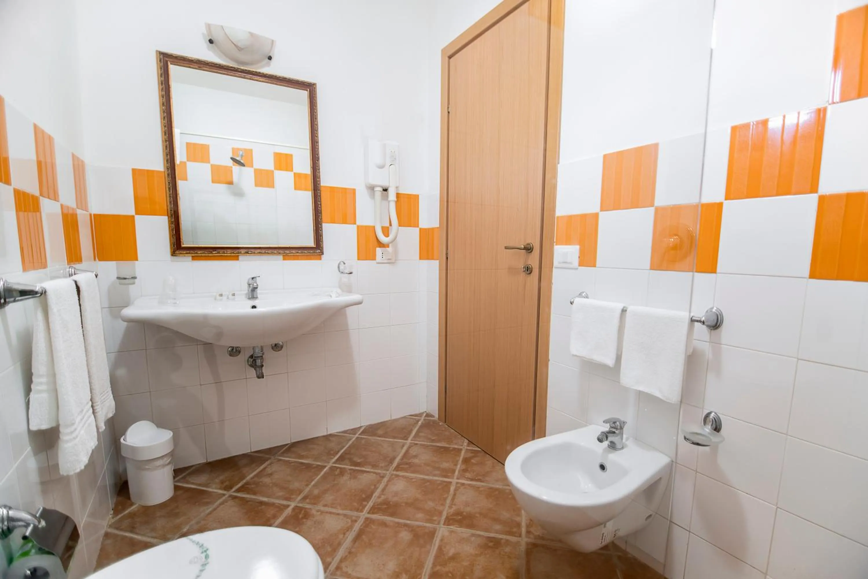 Bathroom in Delfino Beach Hotel