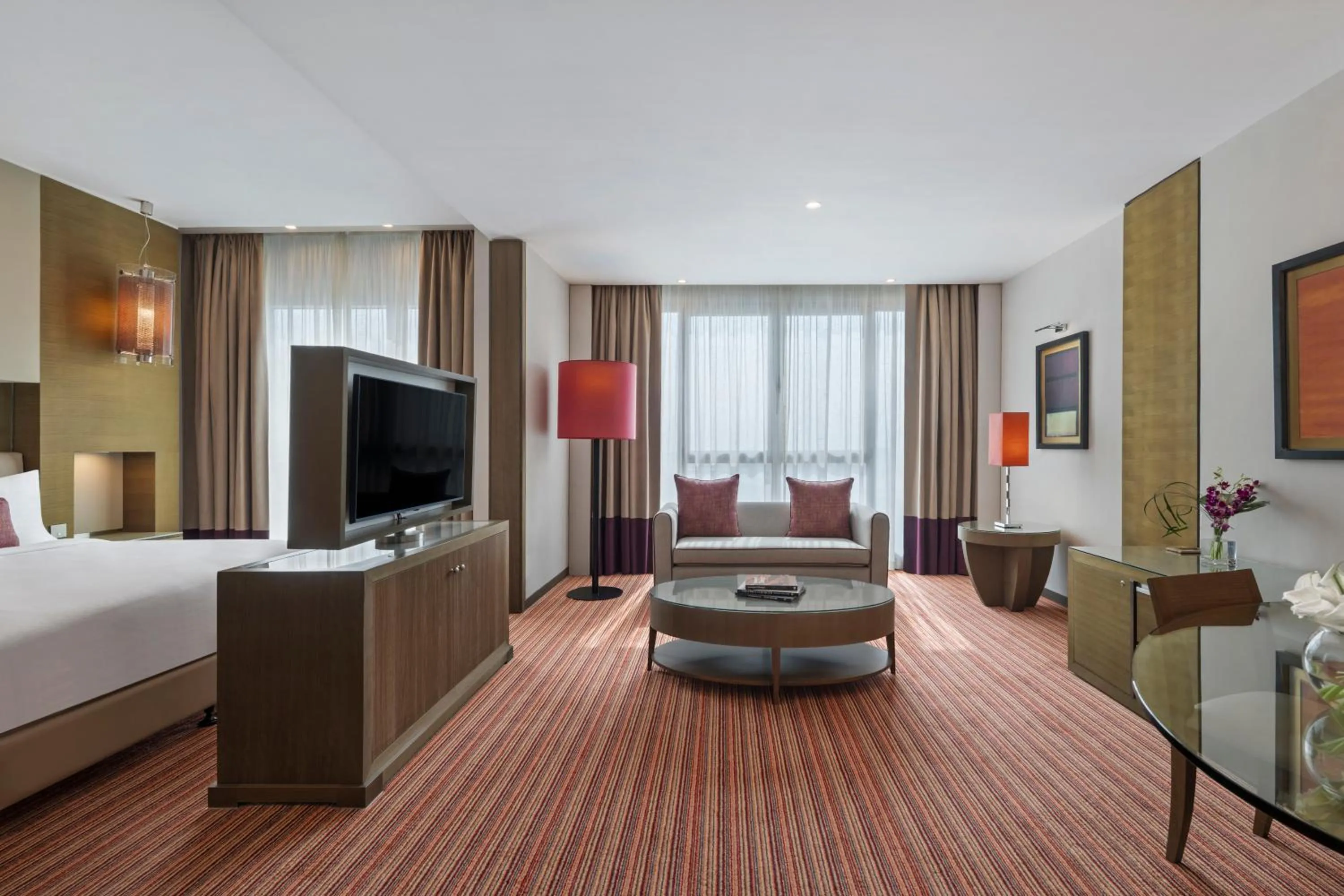 Living room, Bed in Park Rotana Abu Dhabi