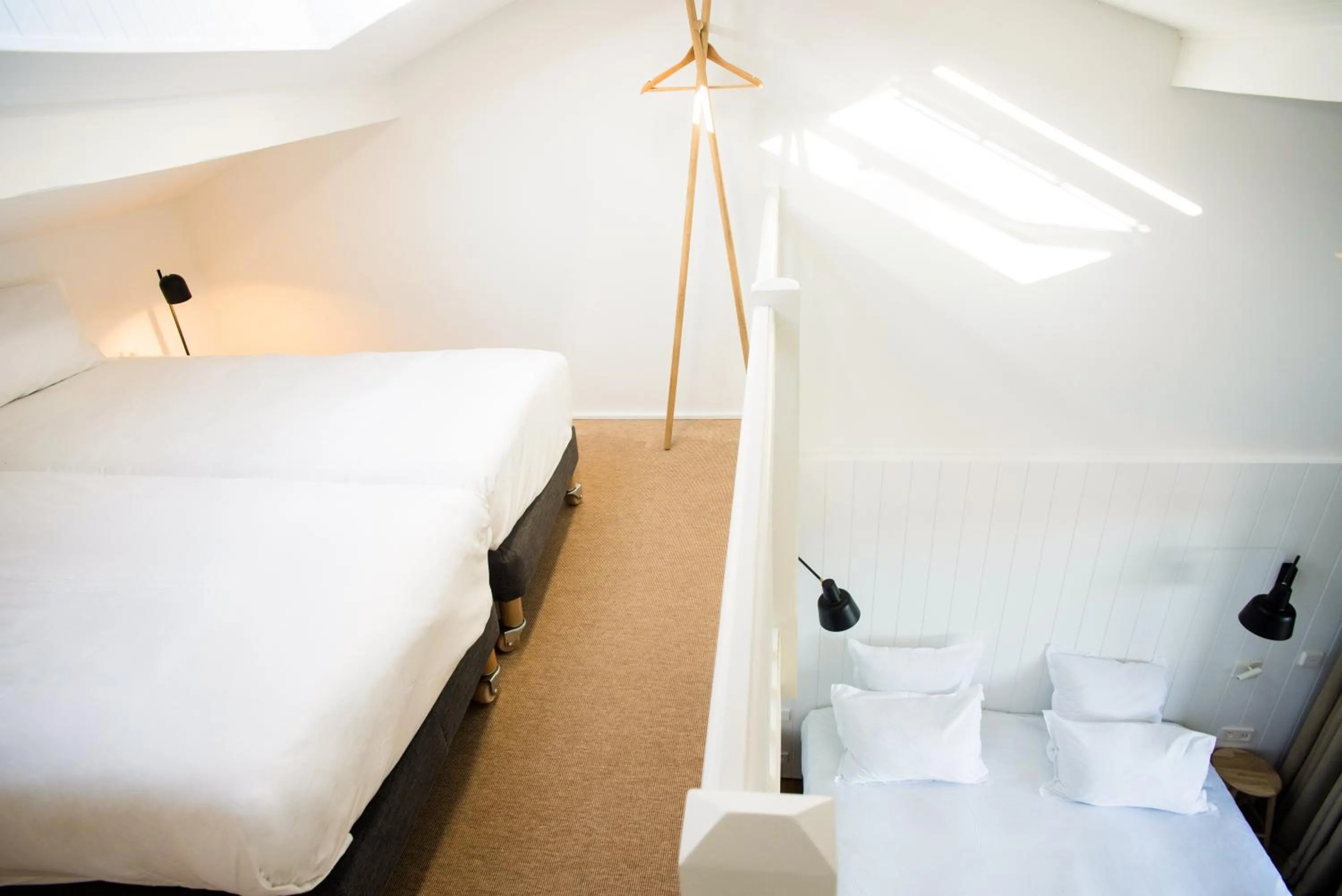 Bed in Hôtel Les Hortensias du Lac