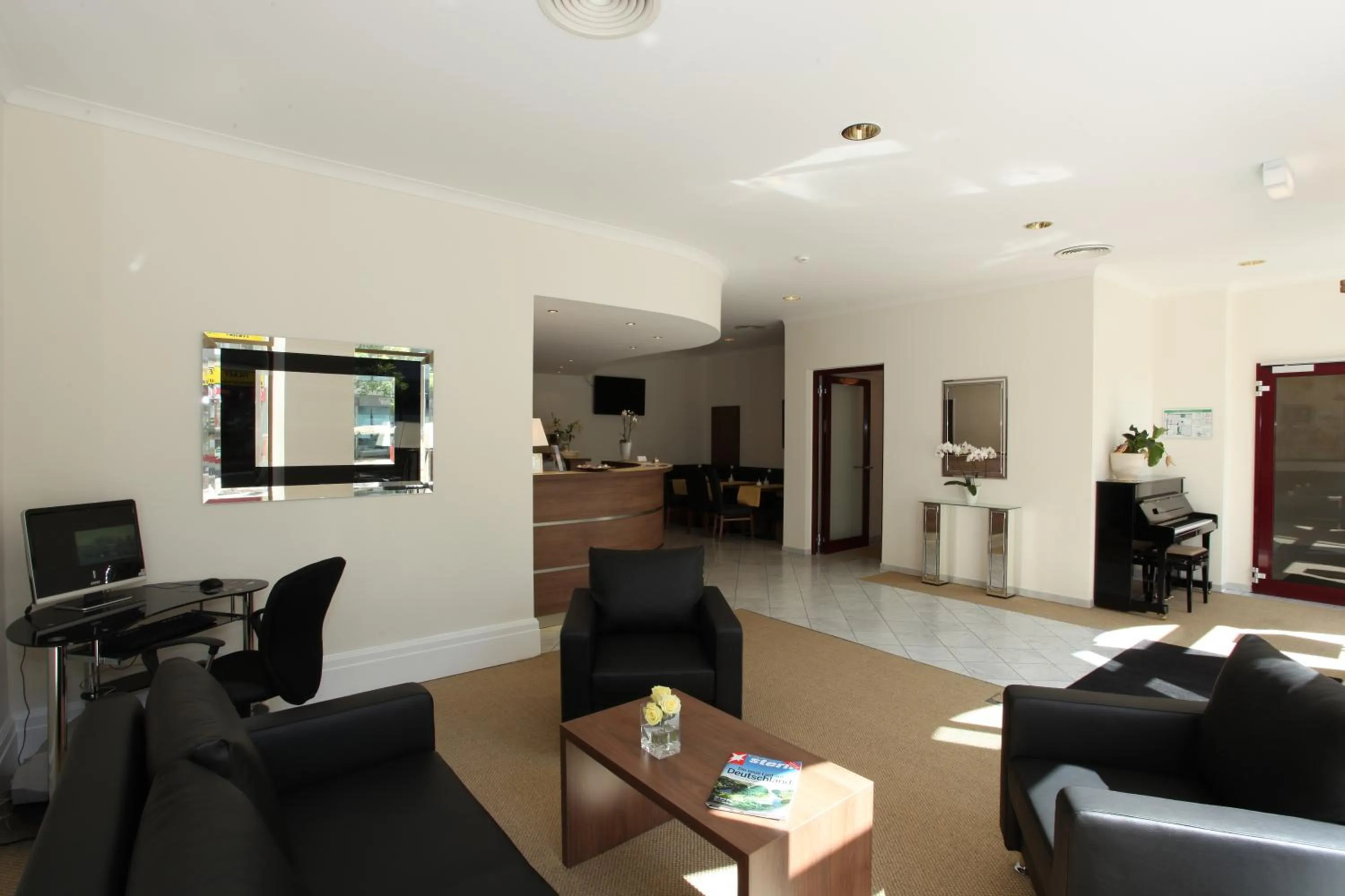 Lobby or reception in Arcade Hotel